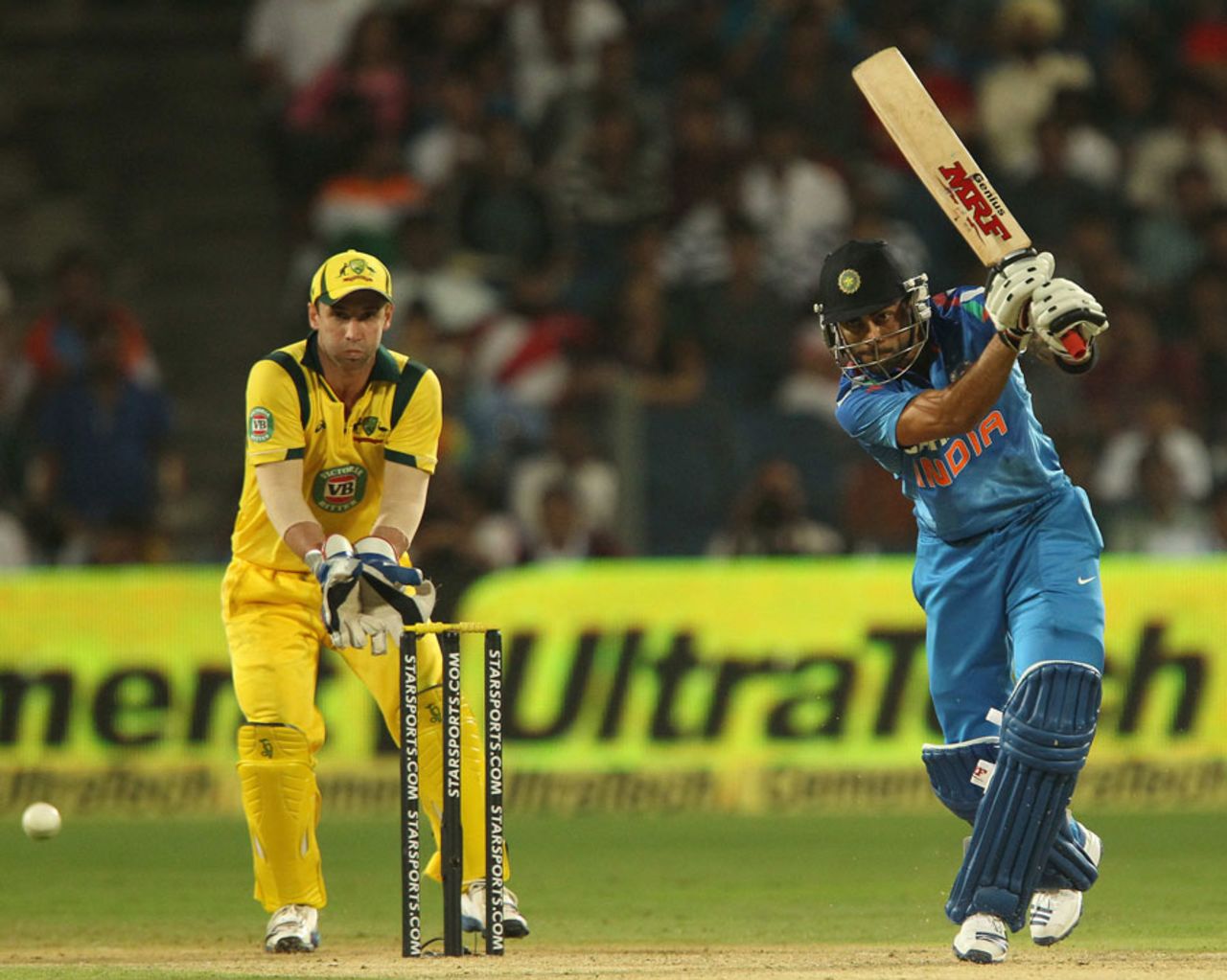 Virat Kohli drives through the covers, India v Australia, 1st ODI, Pune, October 13, 2013
