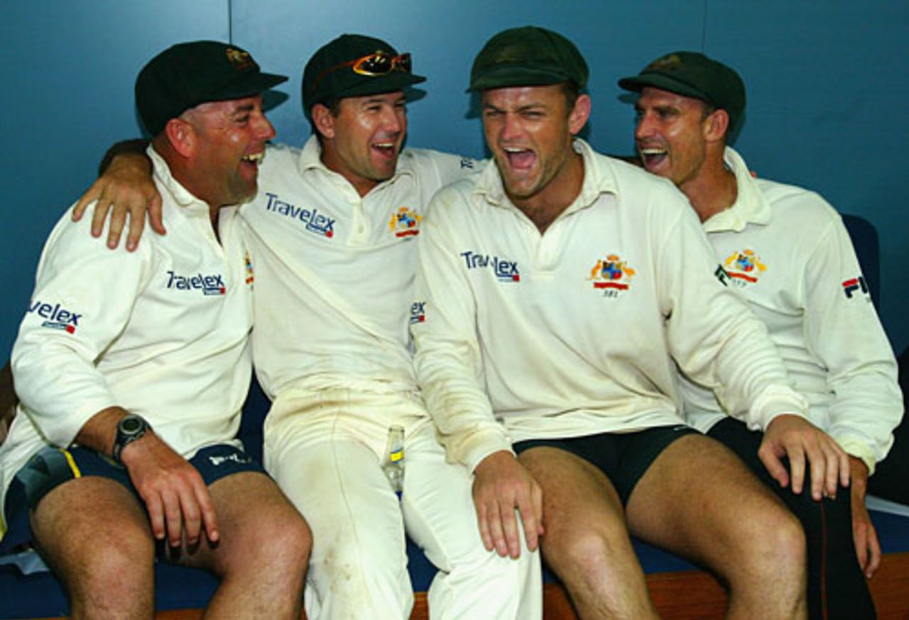 Century makers Darren Lehmann, Ricky Ponting, Adam Gilchrist, and Matthew Hayden celebrate Australia's 188-run win, West Indies v Australia, 2nd Test, Port of Spain, 5th day, April 23, 2003