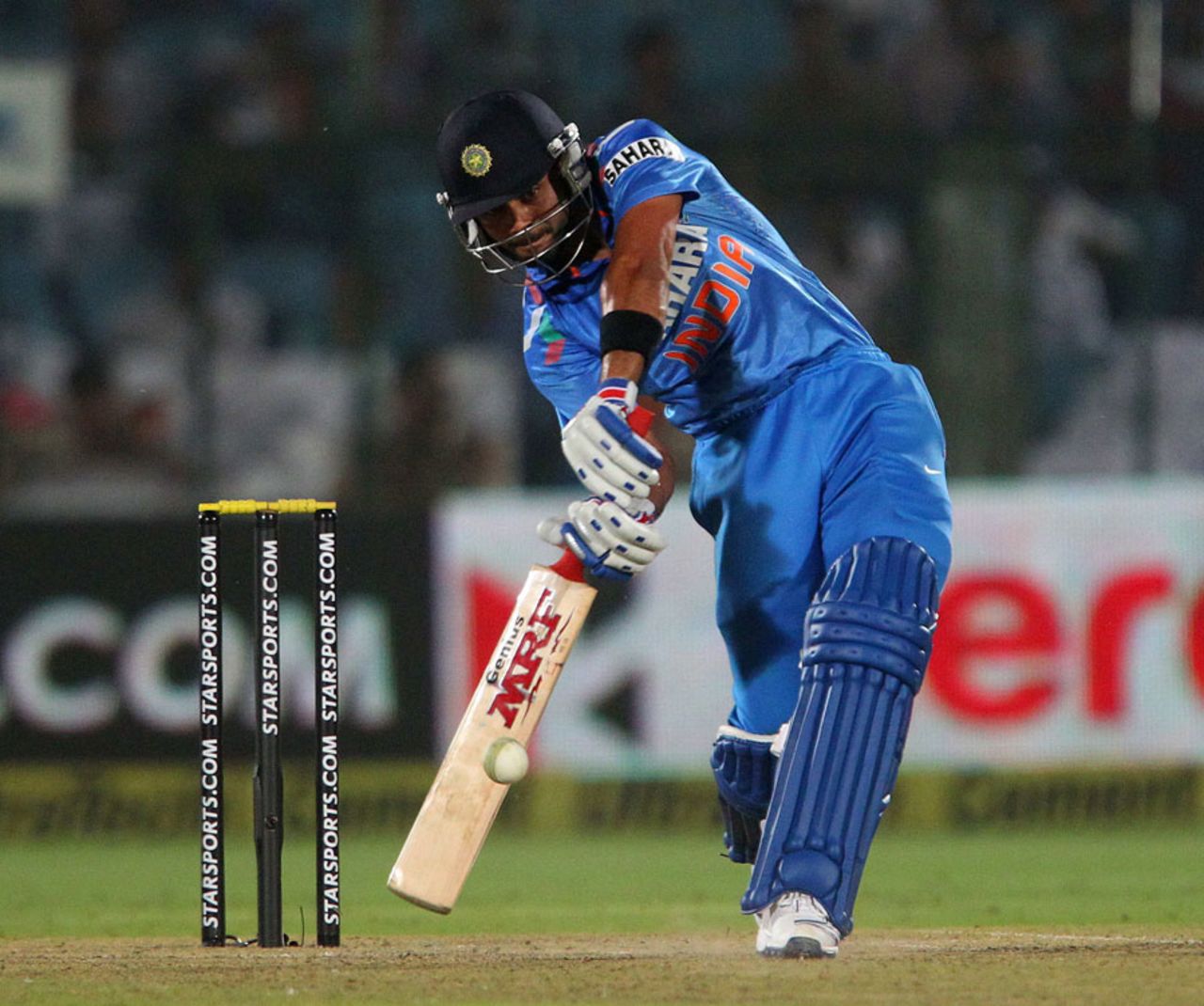 Virat Kohli smacks the ball en route to making India's fastest ODI century, India v Australia, 2nd ODI, Jaipur, October 16, 2013