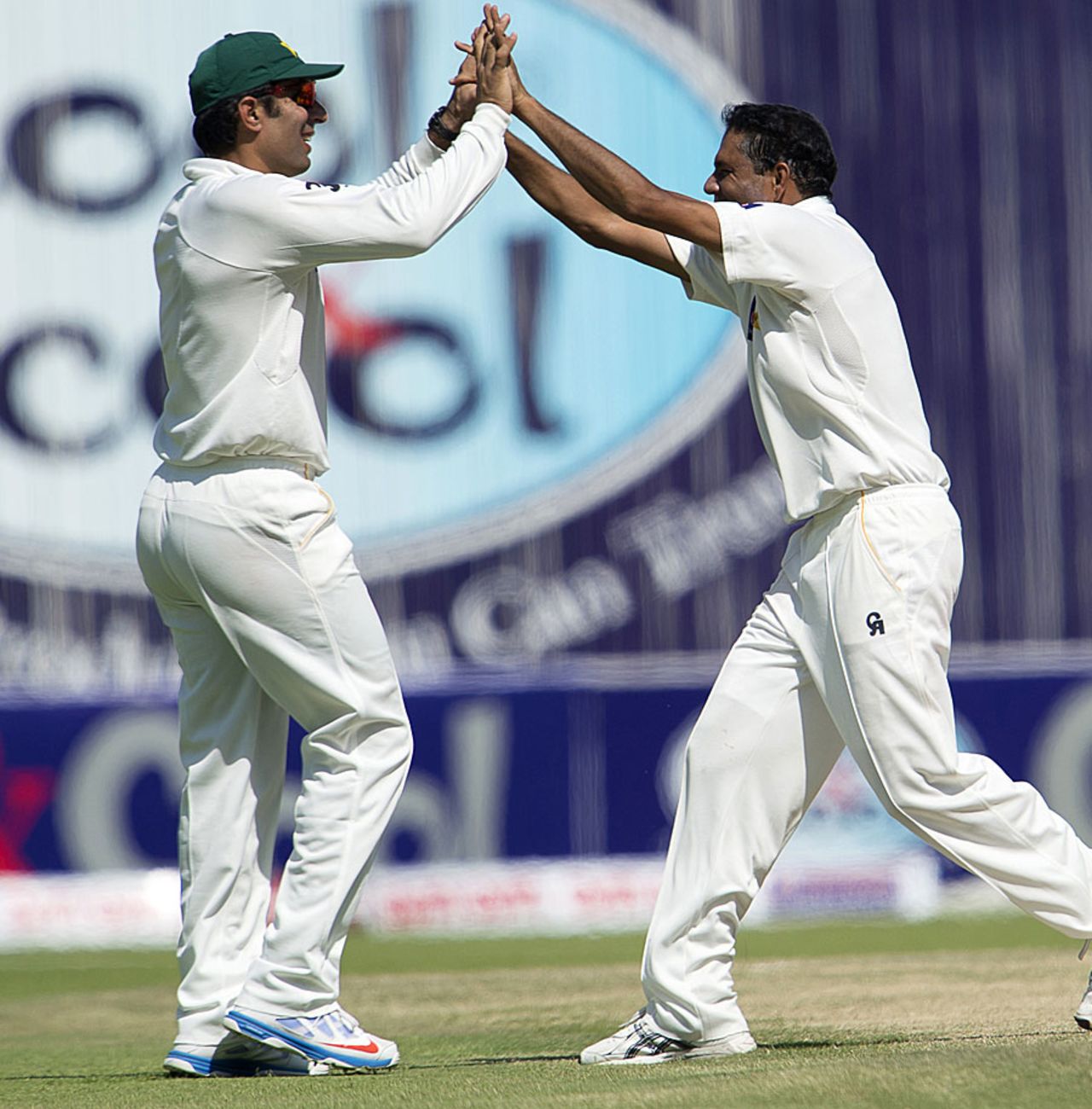 Zulfiqar Babar and Misbah-ul-Haq celebrate a wicket, Pakistan v South Africa, 1st Test, 4th day, Abu Dhabi, October 17, 2013