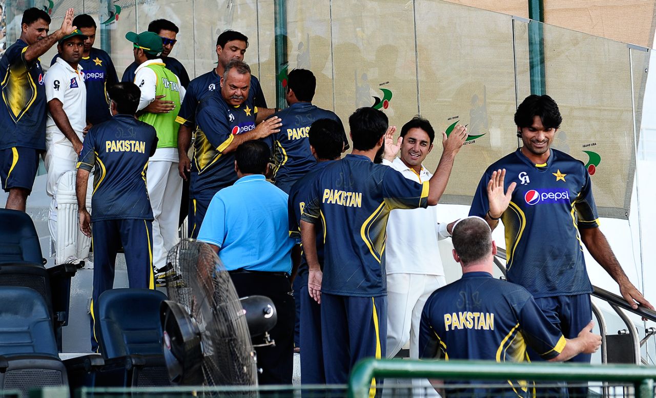 The Pakistan team celebrate victory, Pakistan v South Africa, 1st Test, 4th day, Abu Dhabi, October 17, 2013