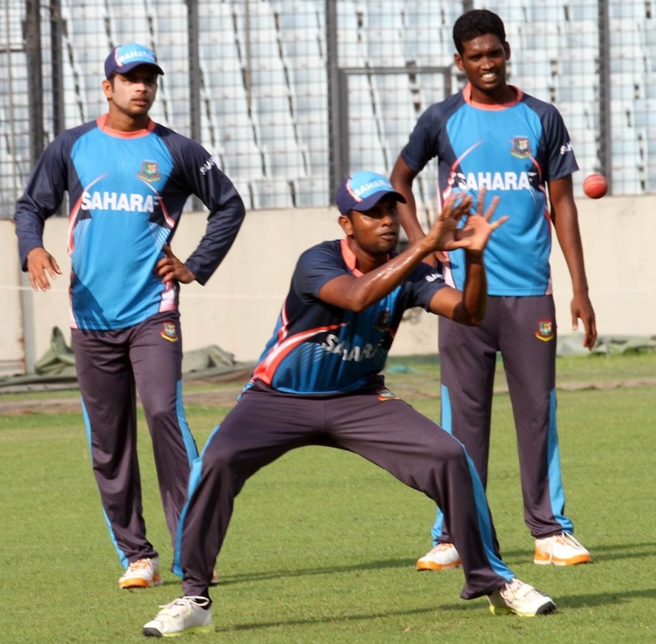 Sohag Gazi takes a catch during practice , Dhaka, October 18, 2013