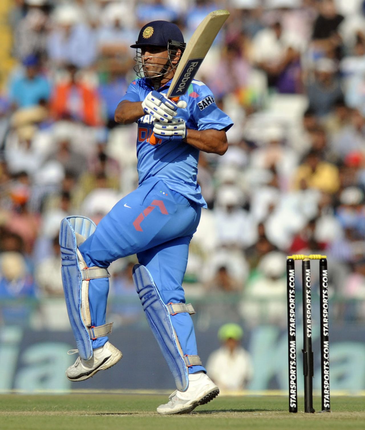 MS Dhoni plays a pull shot, India v Australia, 3rd ODI, Mohali, October 19, 2013