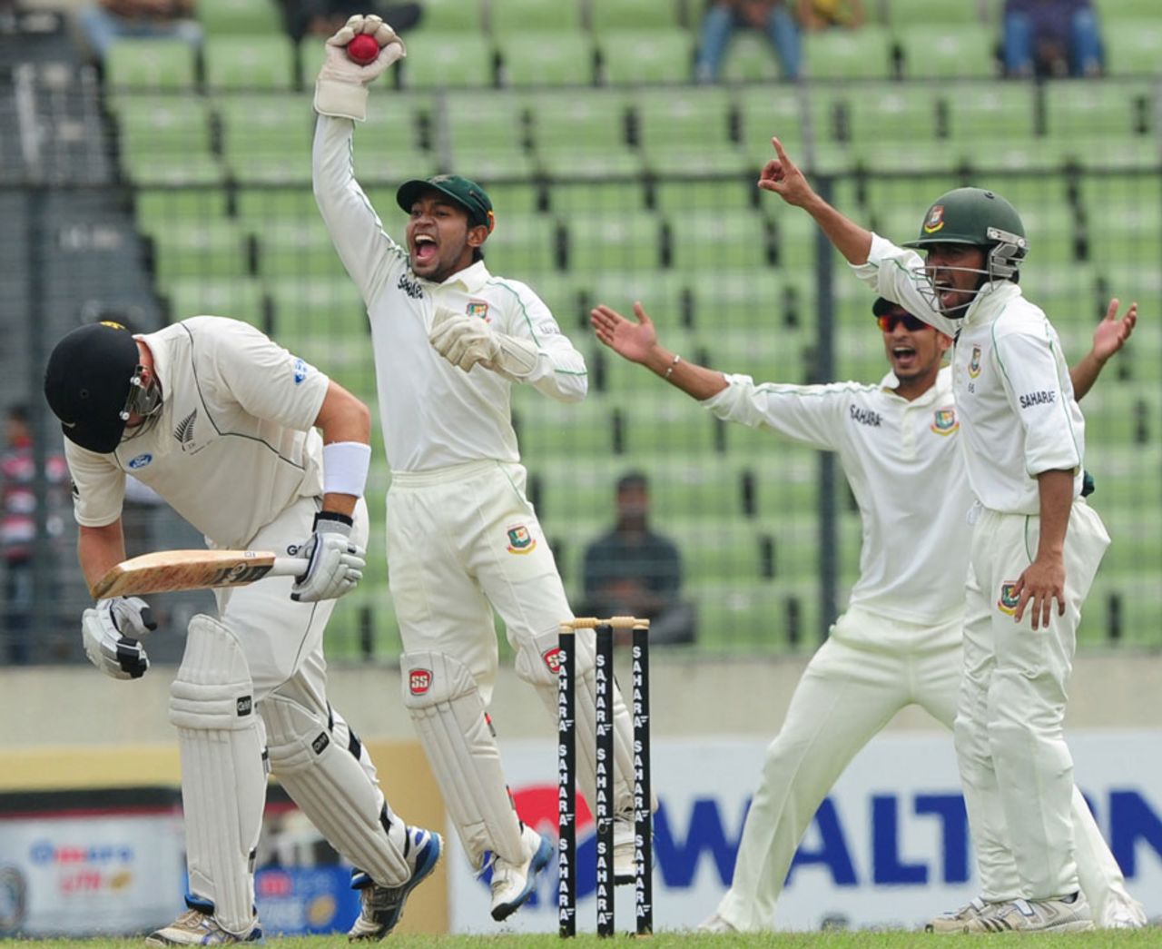 The Bangladeshi players go up for an appeal, Bangladesh v New Zealand, 2nd Test, 2nd day, Mirpur, October 22, 2013