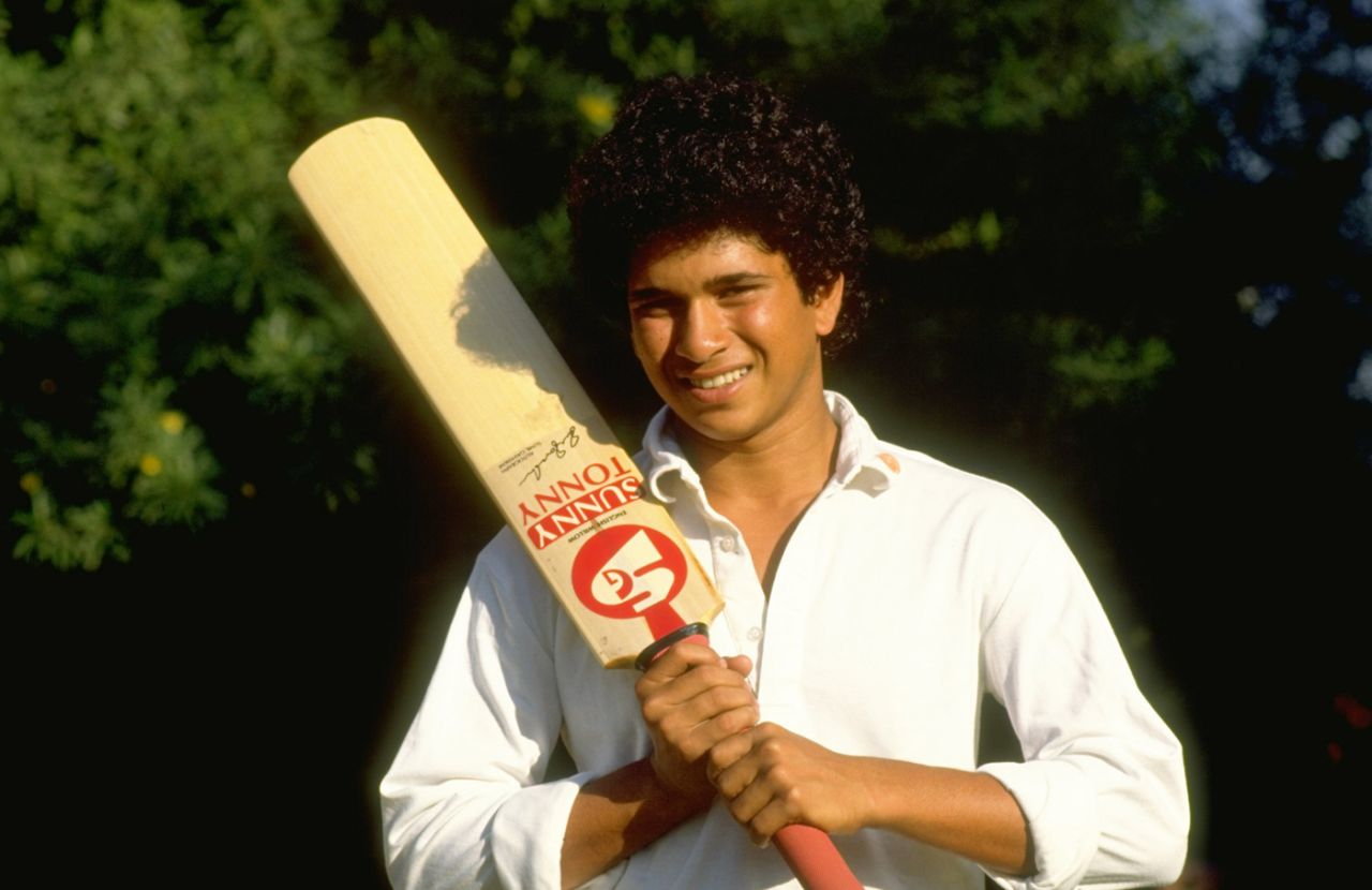 Sachin Tendulkar poses with a bat ahead of his first international tour, to Pakistan, October 1, 1989