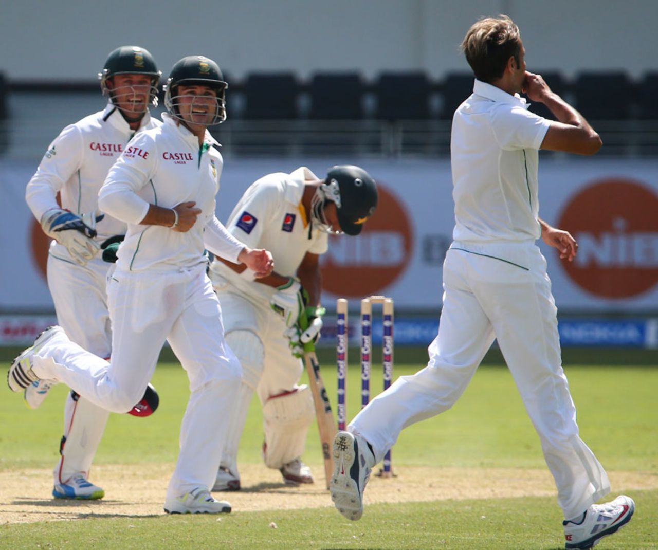 Imran Tahir celebrates the wicket of Shan Masood, Pakistan v South Africa, 2nd Test, 1st day, Dubai, October 23, 2013