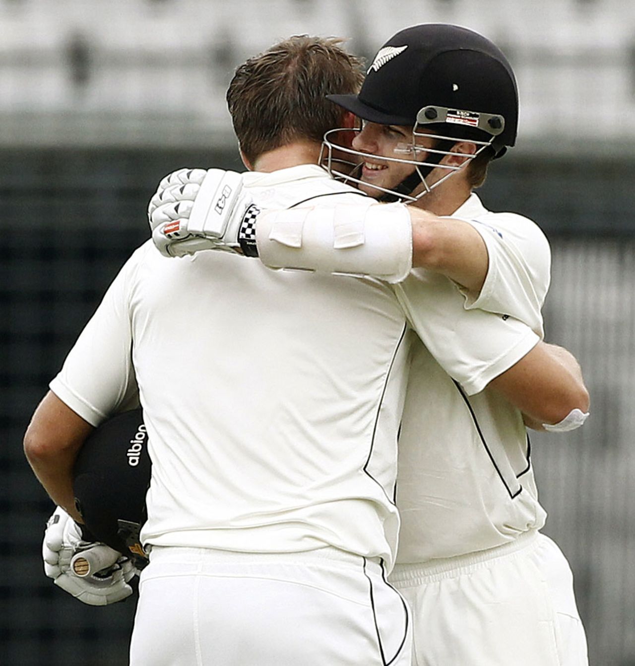 Kane Williamson hugs Corey Anderson after the latter scored his first Test century, Bangladesh v New Zealand, 2nd Test, 3rd day, Mirpur, October 23, 2013