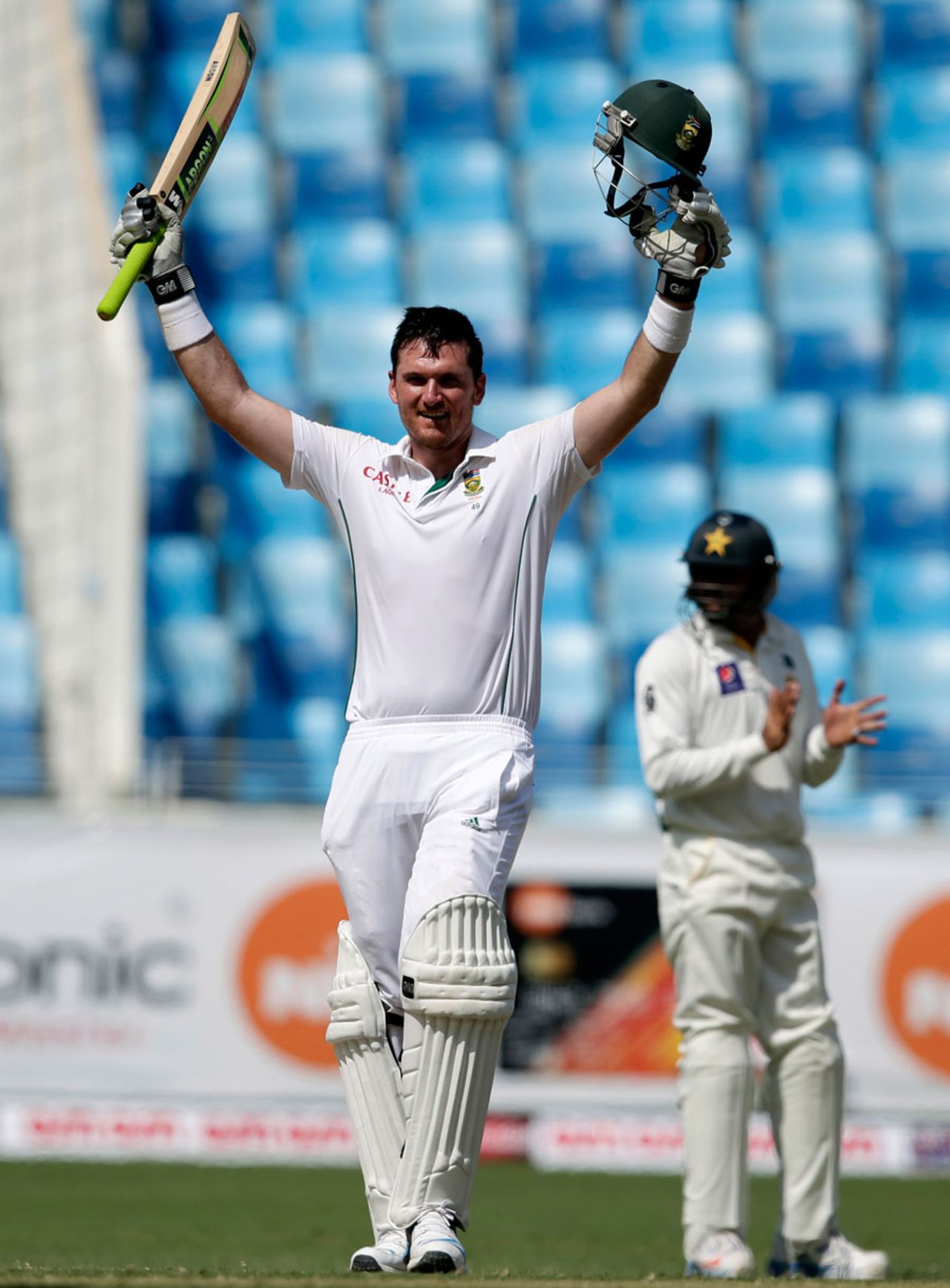 Graeme Smith raises his arms after scoring his 27th Test century, Pakistan v South Africa, 2nd Test, Dubai, 2nd day, October 24, 2013