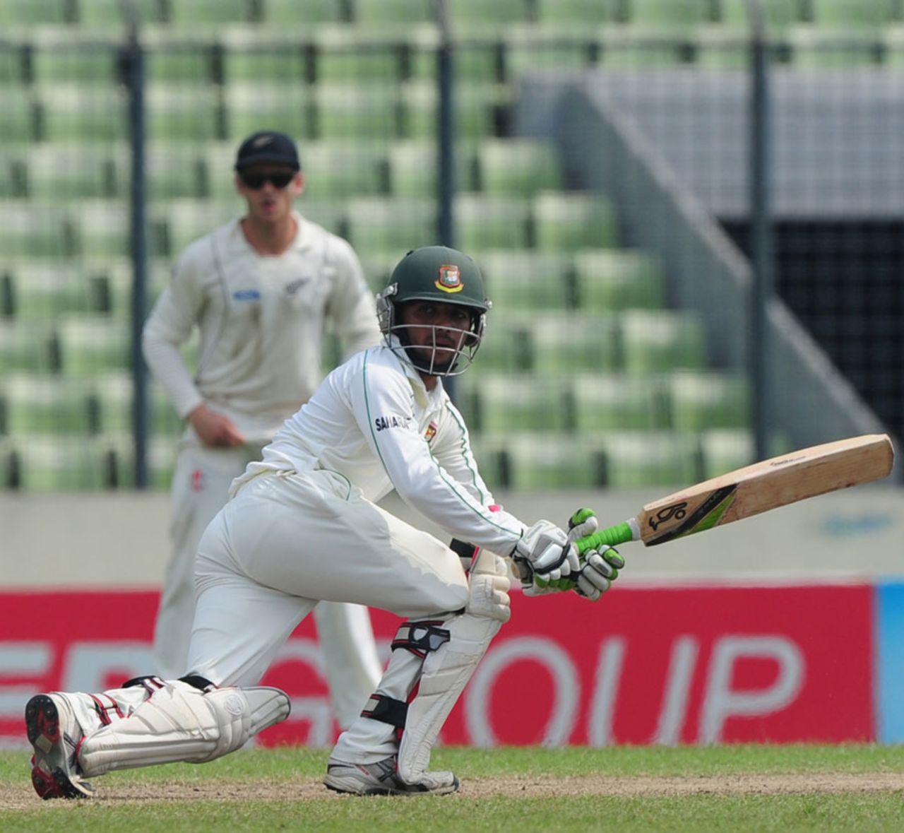 Mominul Haque sweeps behind for a couple, Bangladesh v New Zealand, 2nd Test, 4th day, Mirpur, October 24, 2013