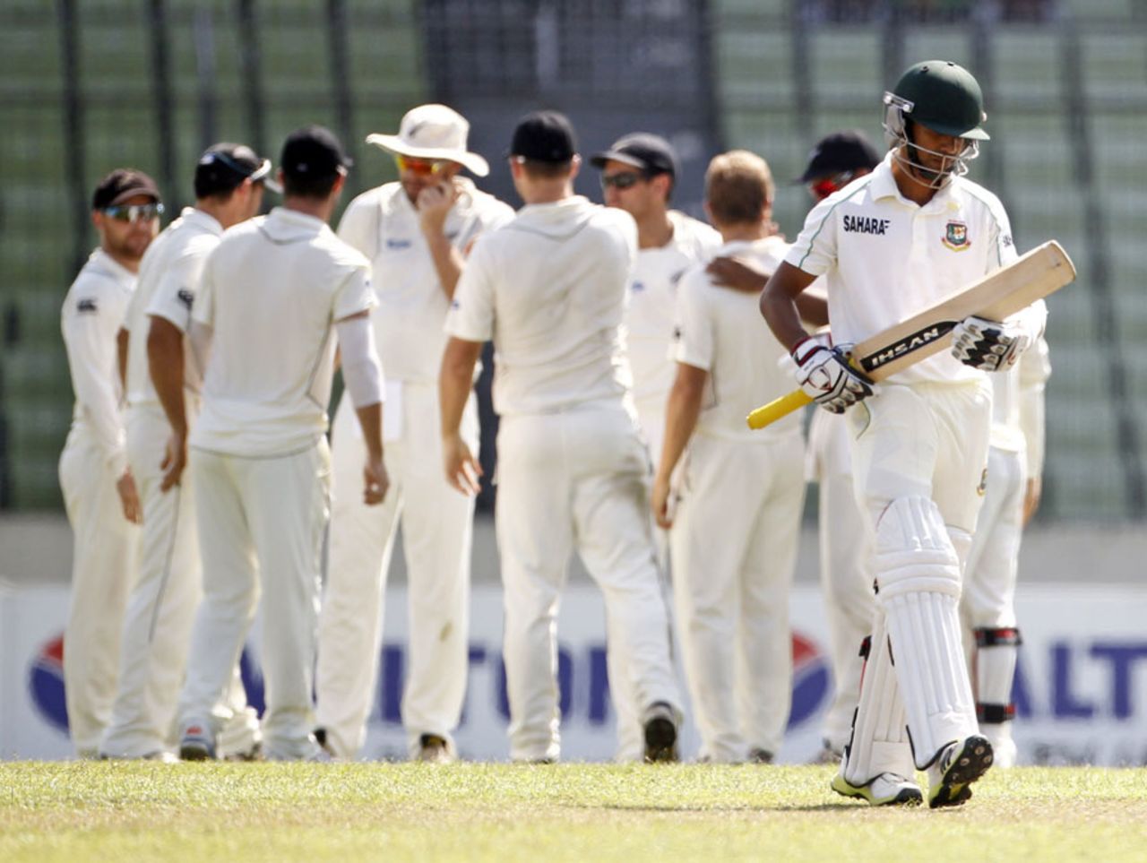Marshall Ayub walks back after being dismissed, Bangladesh v New Zealand, 2nd Test, 4th day, Mirpur, October 24, 2013