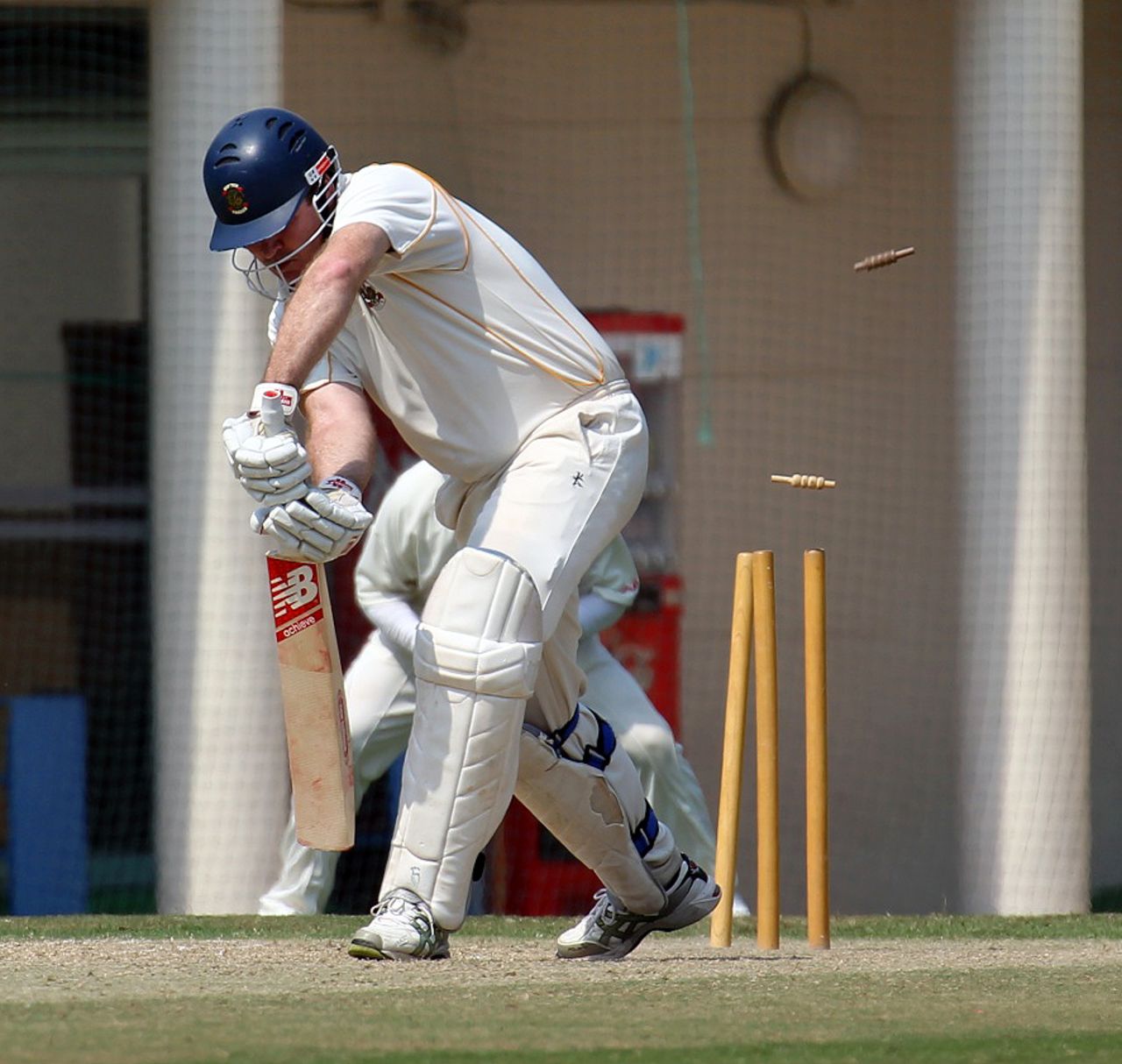 HKCC skipper Tim McMahon is bowled after scoring 86 in the 2013 Fincher Shield match at Kowloon Cricket Club on 26-27th October 2013