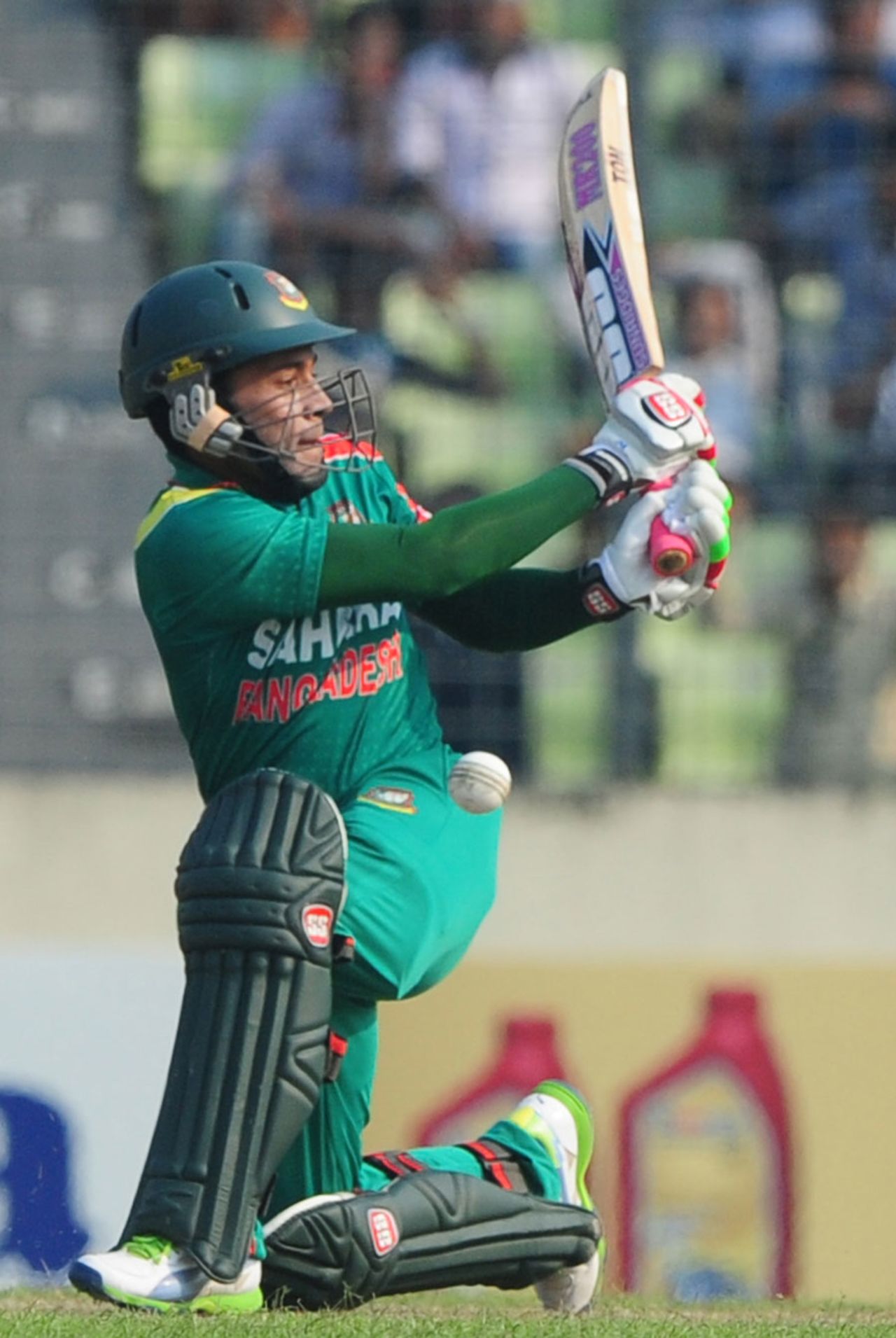 Mushfiqur Rahim plays a sweep shot during his knock, Bangladesh v New Zealand, 1st ODI, Mirpur, October 29, 2013