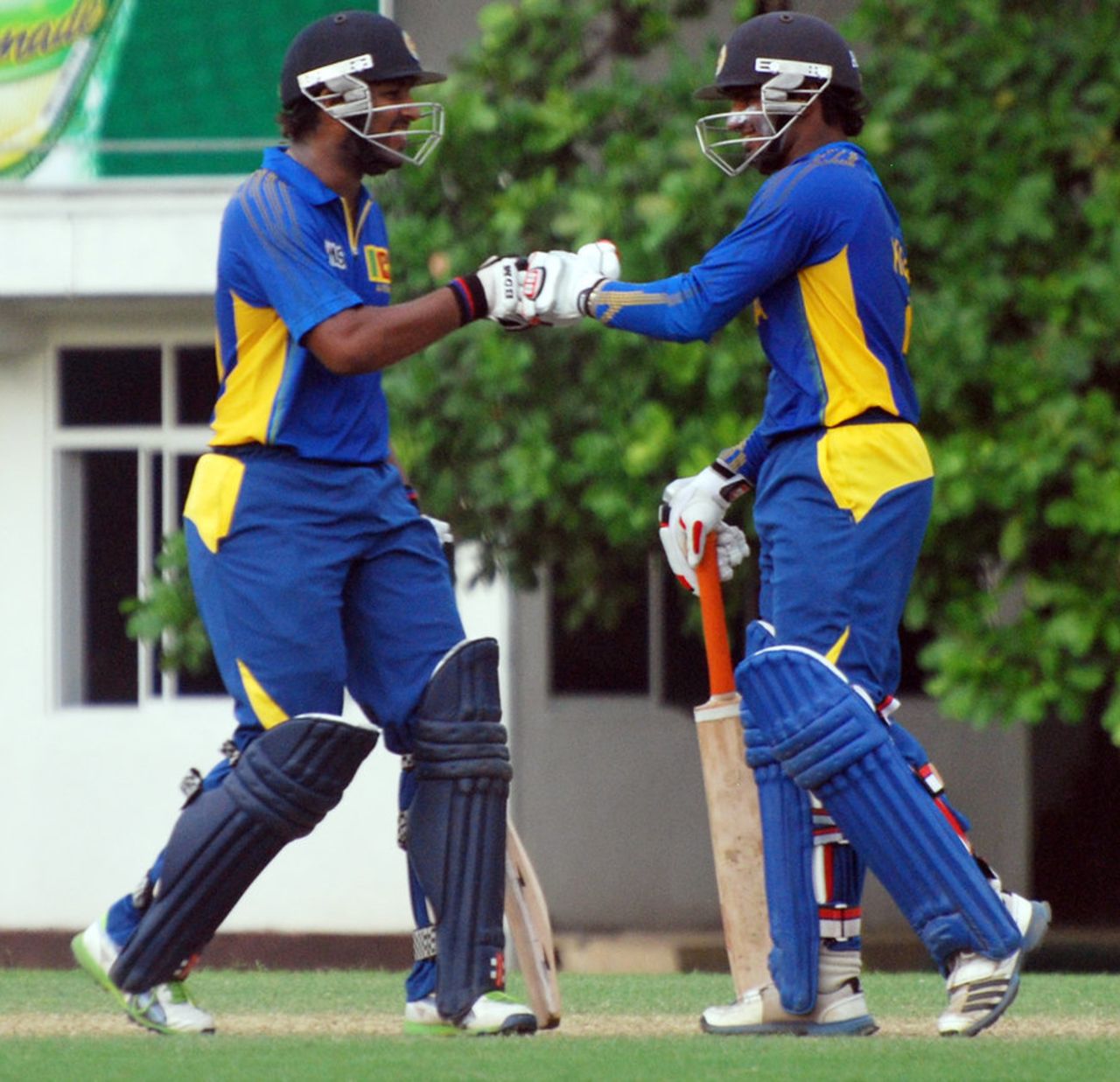 Shehan Jayasuriya and Kusal Perera punch gloves during their 116-run opening stand, Sri Lanka A v Kenya, 3rd unofficial T20, NCC