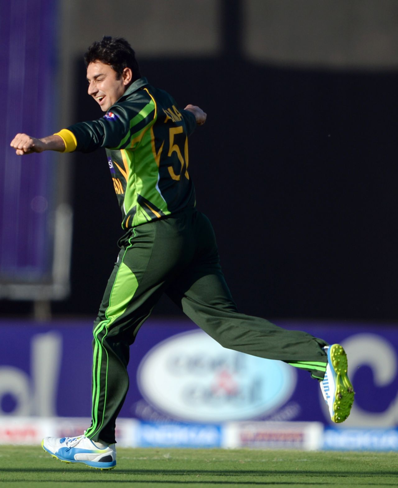 Saeed Ajmal takes off after claiming a wicket, Pakistan v South Africa, 1st ODI, Sharjah, October 30, 2013