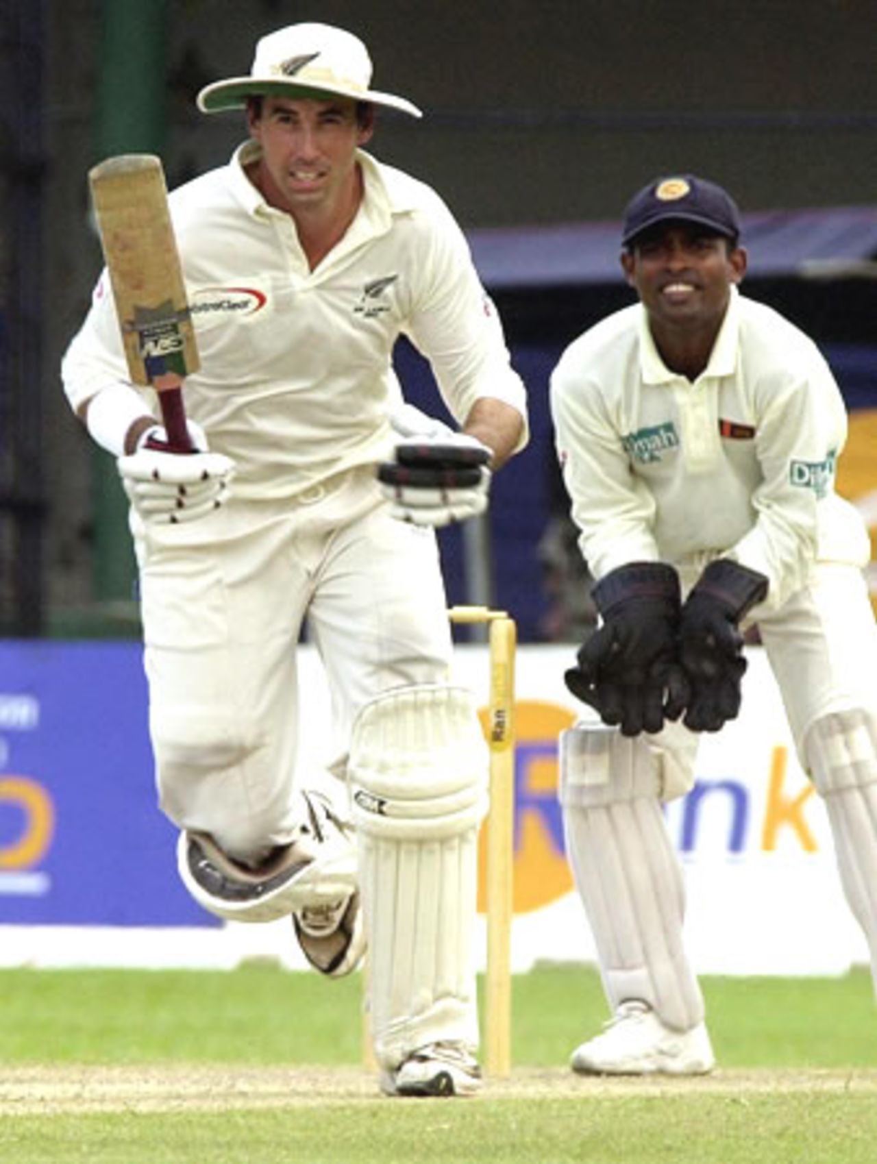 New Zealand captain Stephen Fleming takes a run as he ended the first session of the second day of the first Test against Sri Lanka 26 April 2003 at the P Sara Stadium in Colombo