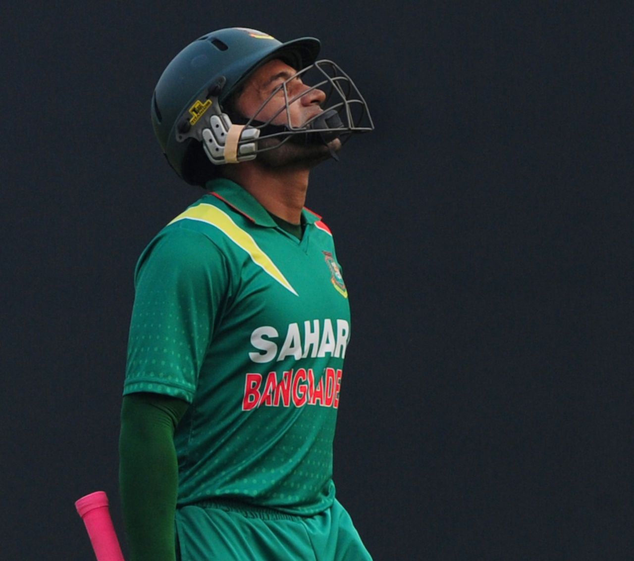 Mushfiqur Rahim walks back disappointed after being dismissed, Bangladesh v New Zealand, 2nd ODI, Mirpur, October 31, 2013