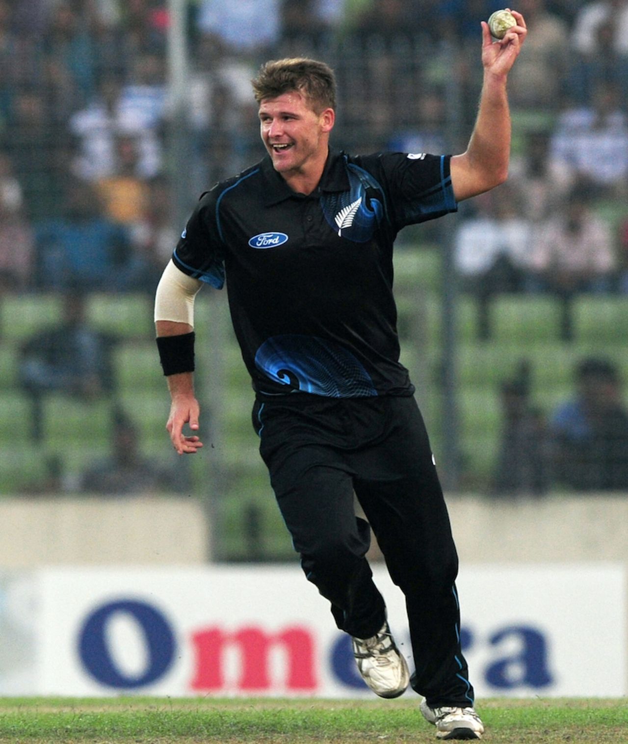 Corey Anderson reacts after taking a catch off his own bowling, Bangladesh v New Zealand, 2nd ODI, Mirpur, October 31, 2013