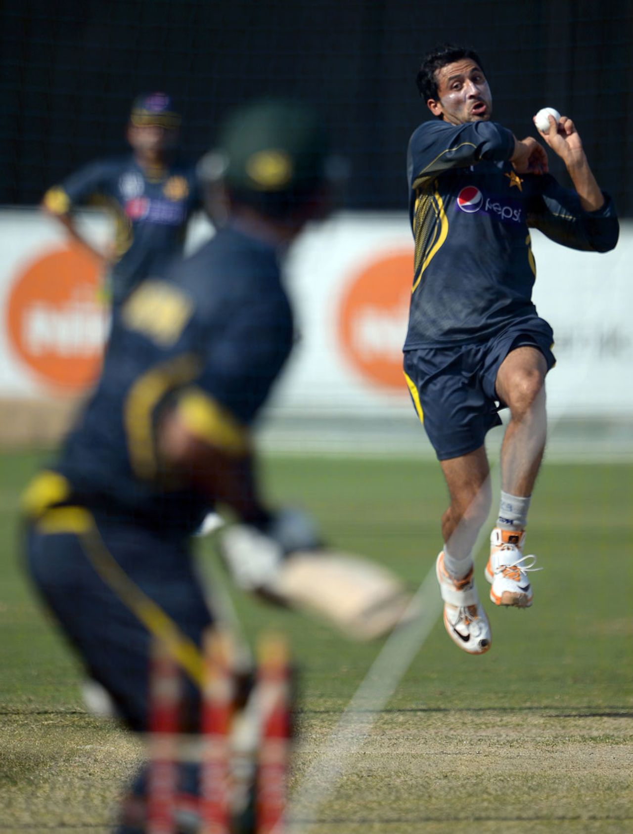 Junaid Khan runs in to bowl during a practice session on the eve of the second ODI, Dubai, October 31, 2013
