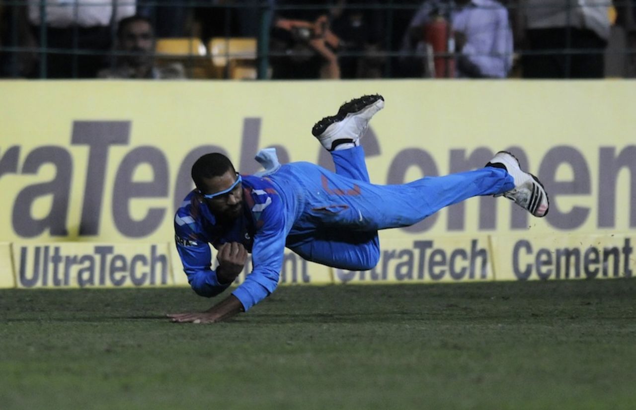 Shikhar Dhawan completes a catch to dismiss James Faulkner, India v Australia, 7th ODI, Bangalore, November 2, 2013