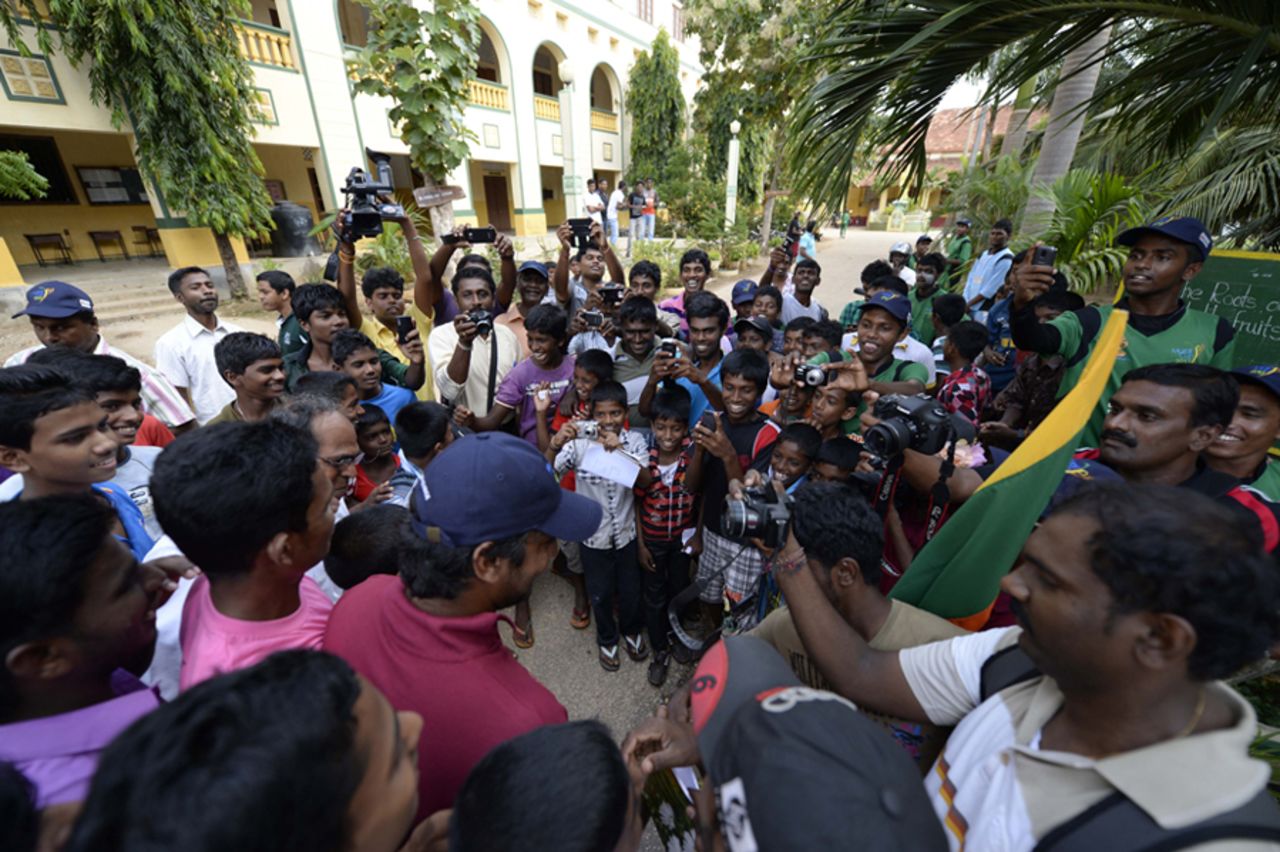 Kumar Sangakkara is photographed by adoring young fans, Jaffna, November 1, 2013