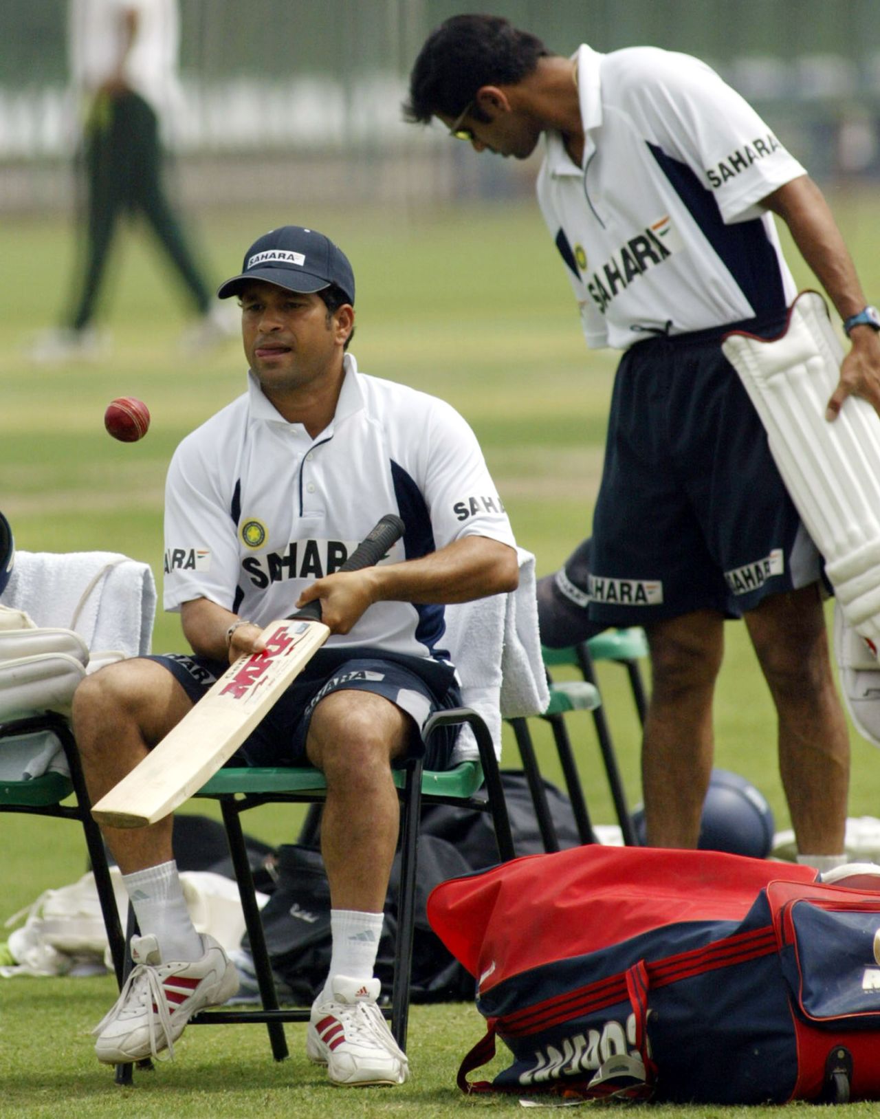 Sachin Tendulkar bounces a ball on his bat while Rahul Dravid prepares for net practice ahead of the second Test, Lahore, April 4, 2004