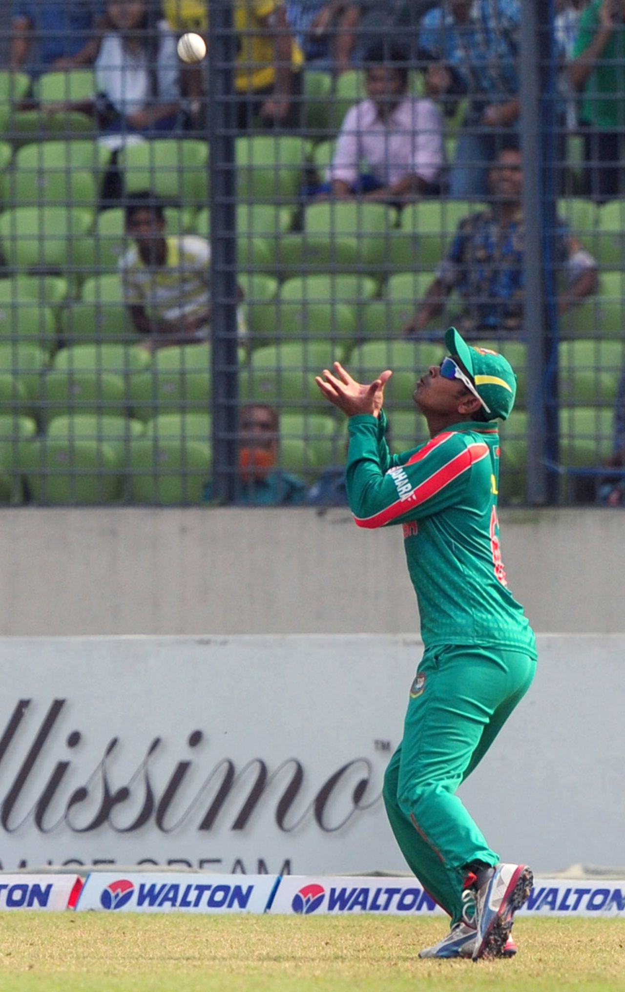 Shamsur Rahman takes a catch to dismiss Anton Devcich, Bangladesh v New Zealand, only T20I, Mirpur, November 6, 2013