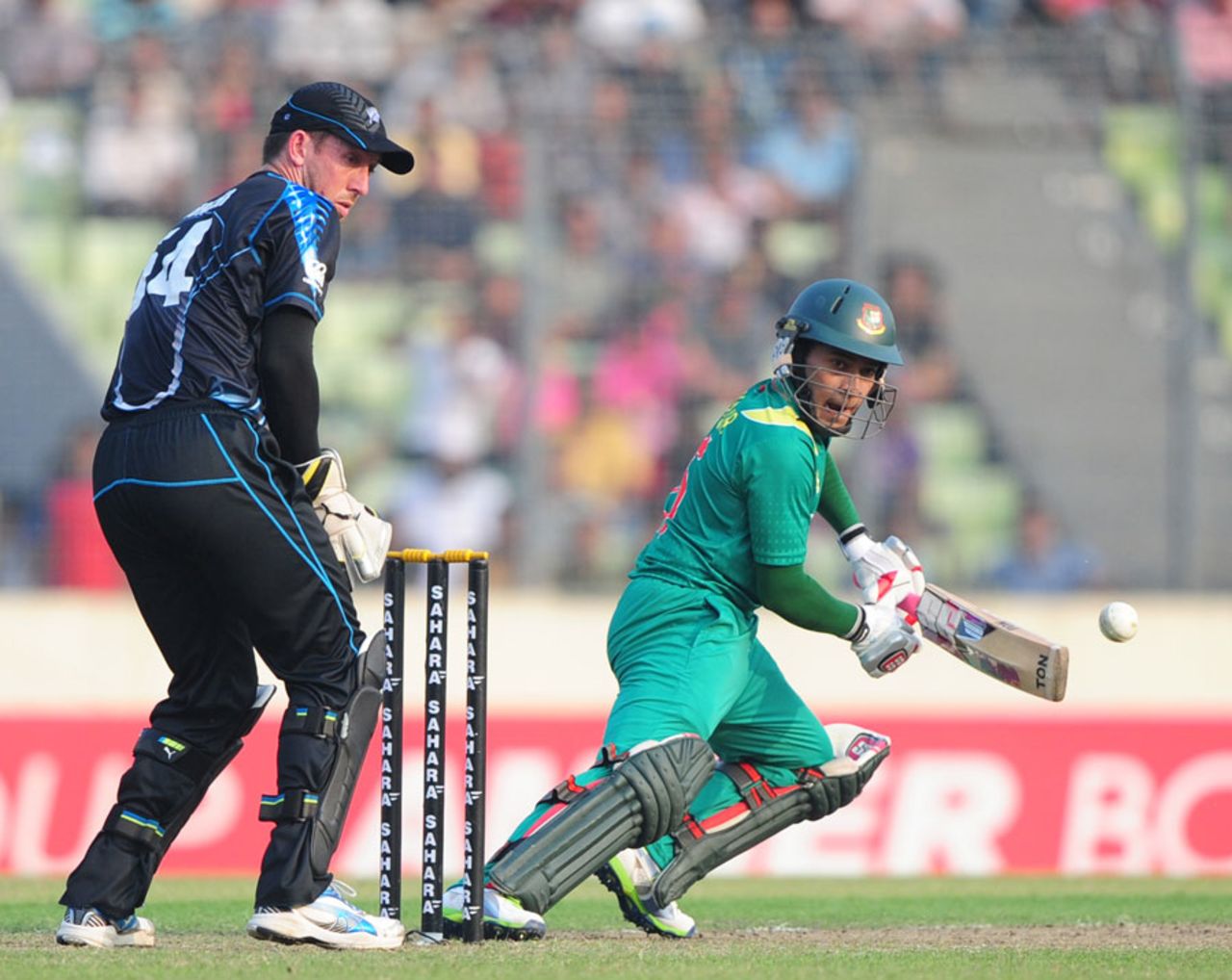 Mushfiqur Rahim guides the ball during his fifty, Bangladesh v New Zealand, only T20I, Mirpur, November 6, 2013