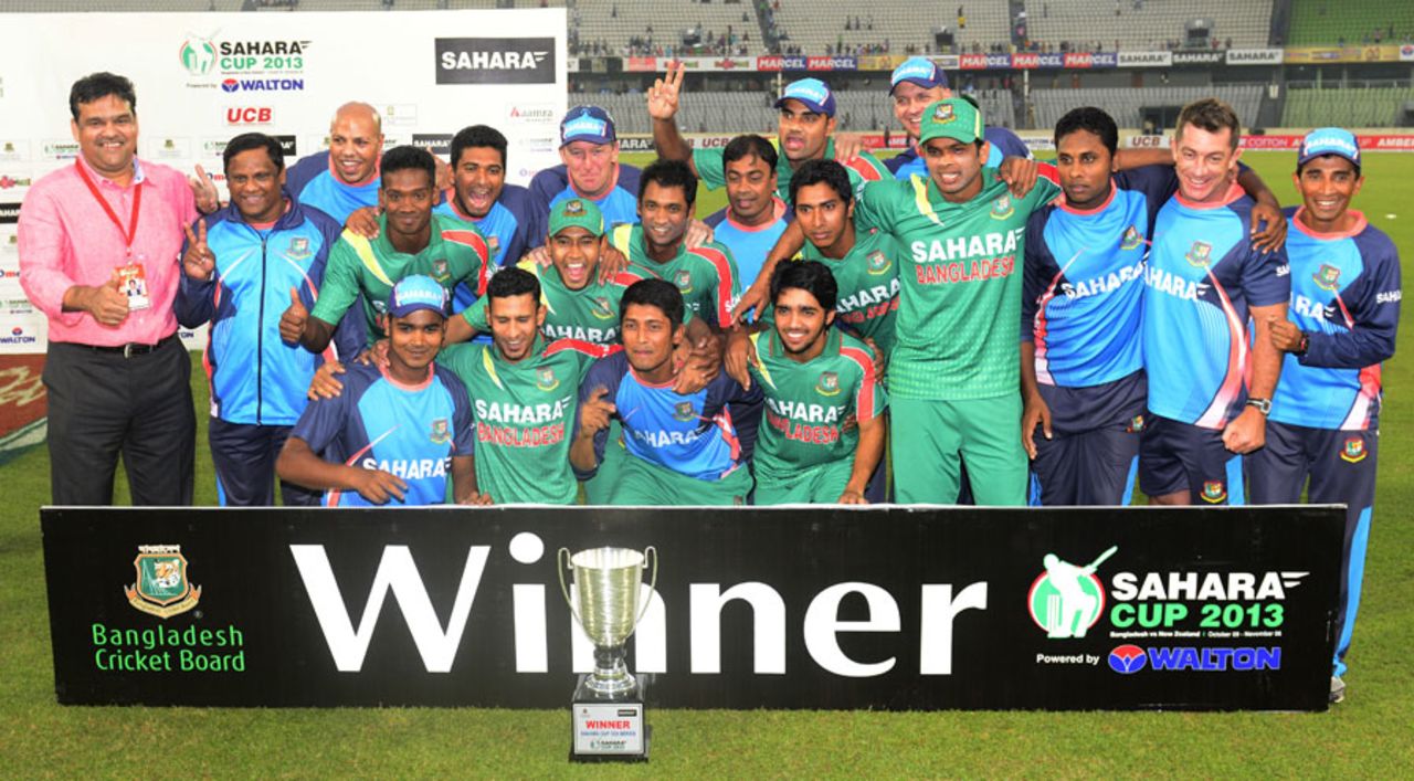The Bangladesh team pose with the ODI series trophy, Bangladesh v New Zealand, only T20I, Mirpur, November 6, 2013