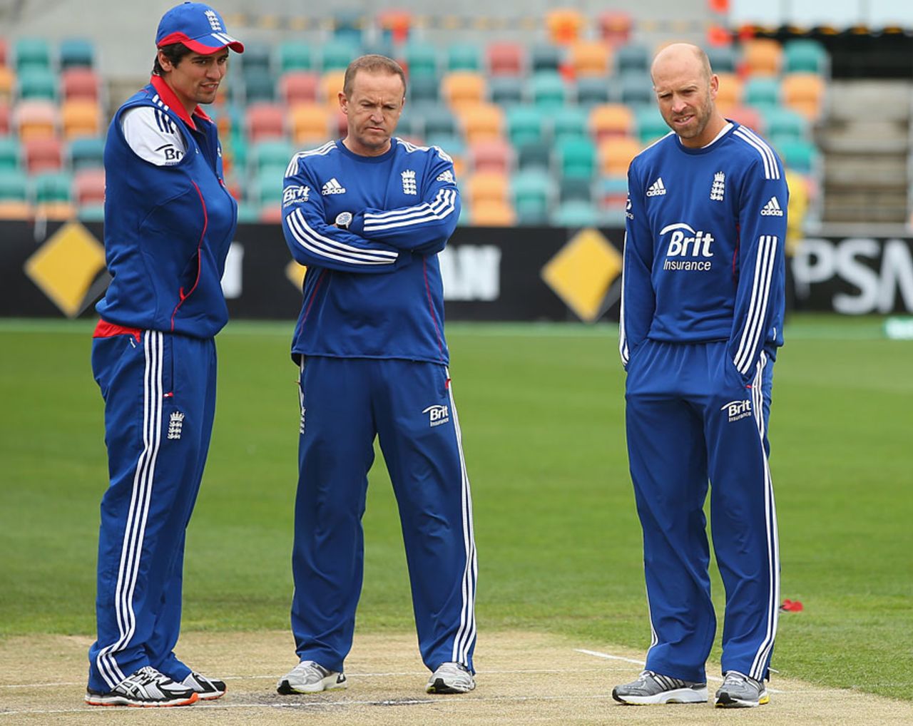 Alastair Cook, Andy Flower and Matt Prior inspect the damp, chilly scene, Australia A v England XI, Tour match, Hobart, 2nd day, November 7, 2013