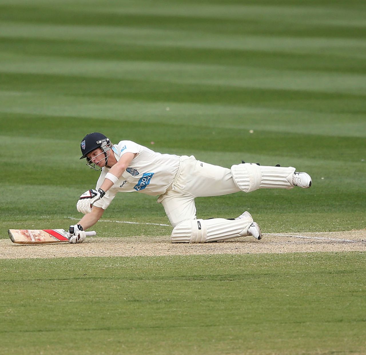 Steven Smith slips during his hundred, Victoria v New South Wales, Sheffield Shield, Melbourne, 2nd day, November 7, 2013