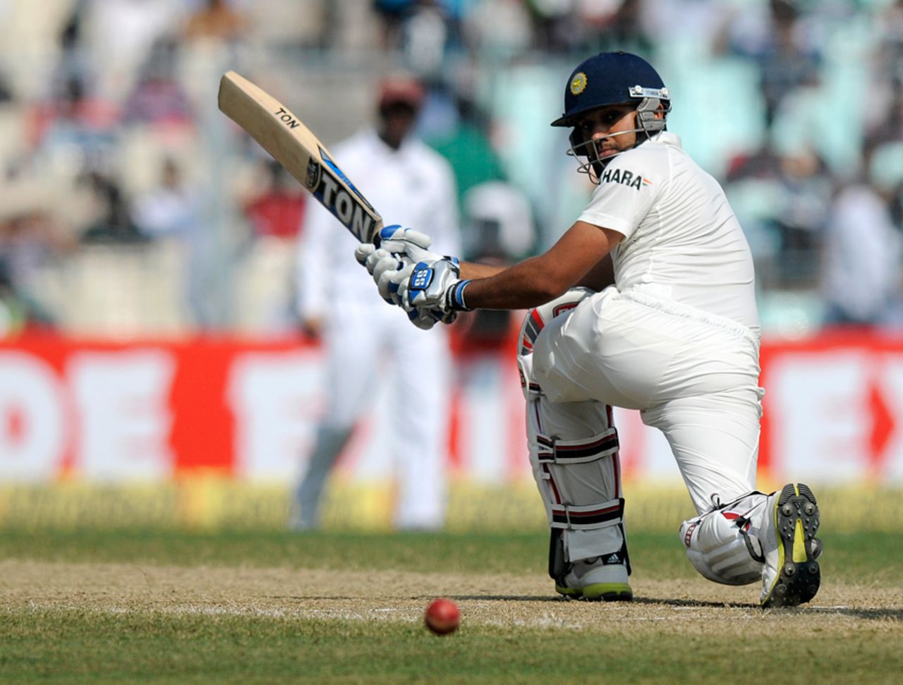 Rohit Sharma sweeps during his 177, India v West Indies, 1st Test, Kolkata, 3rd day, November 8, 2013