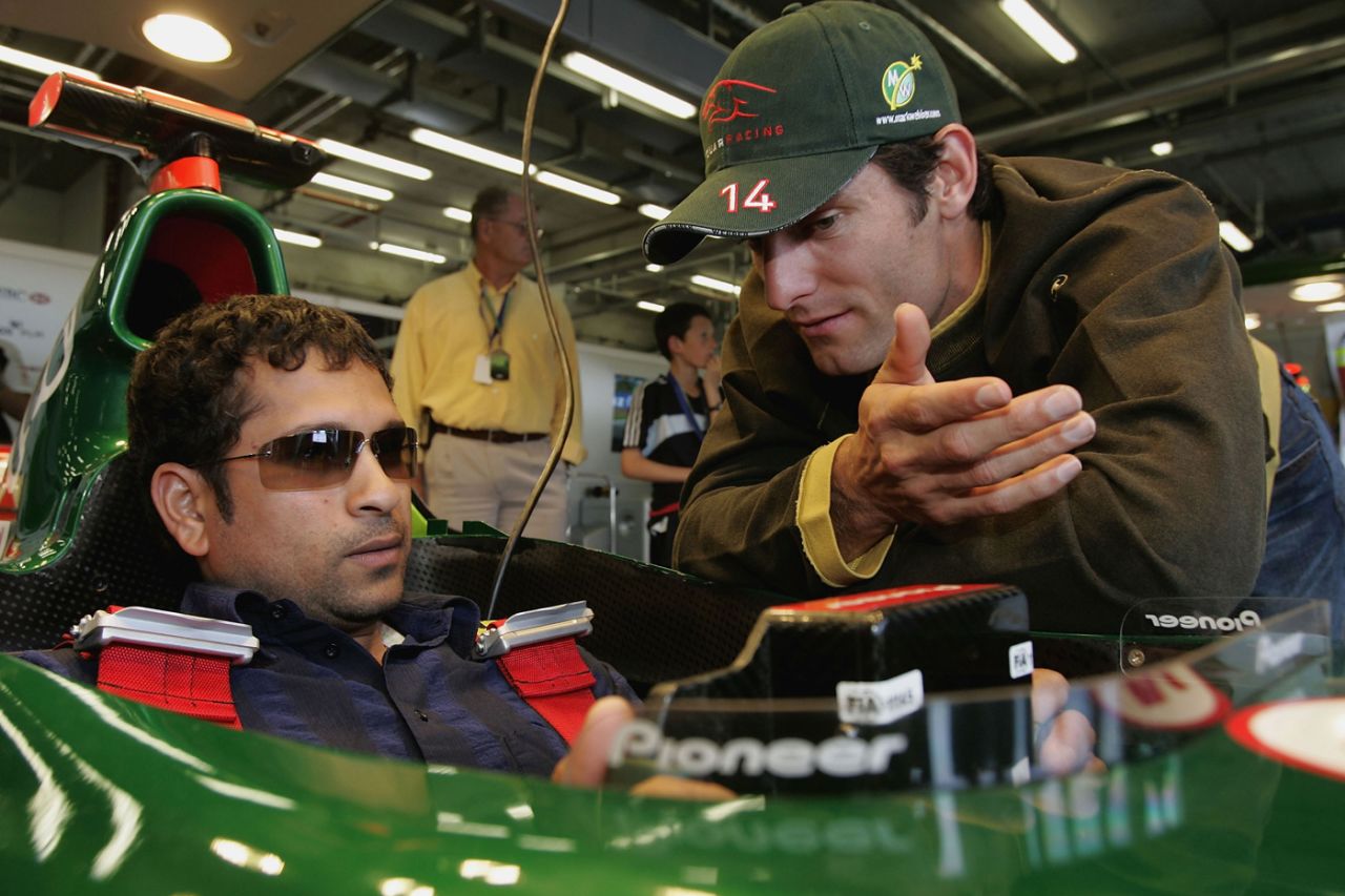 Sachin Tendulkar tries Mark Webber's F1 car for size after qualifying at the European Grand Prix, Nuremberg, May 29, 2004