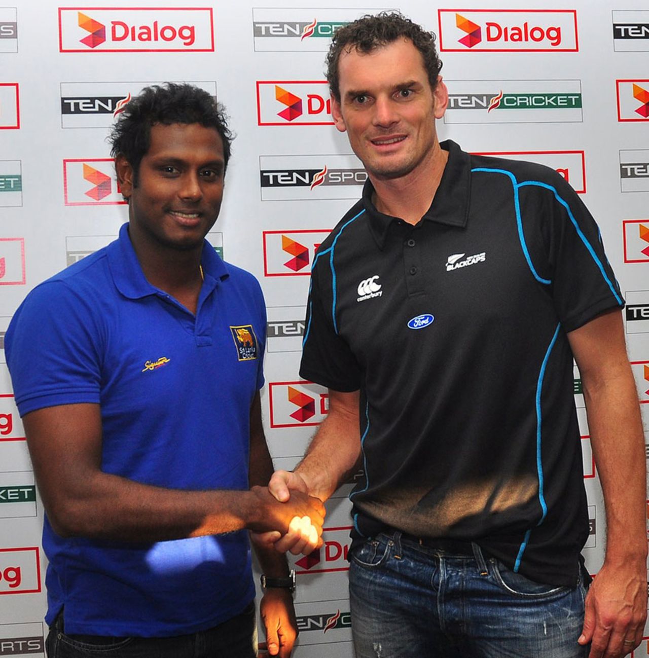 Angelo Mathews and Kyle Mills pose ahead of the one-day series, Colombo, November 8, 2013