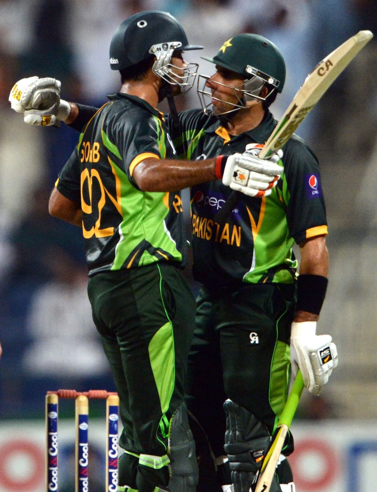 Sohaib Maqsood is congratulated by Misbah-ul-Haq after his fifty on debut, Pakistan v South Africa, 4th ODI, Abu Dhabi, November 8, 2013