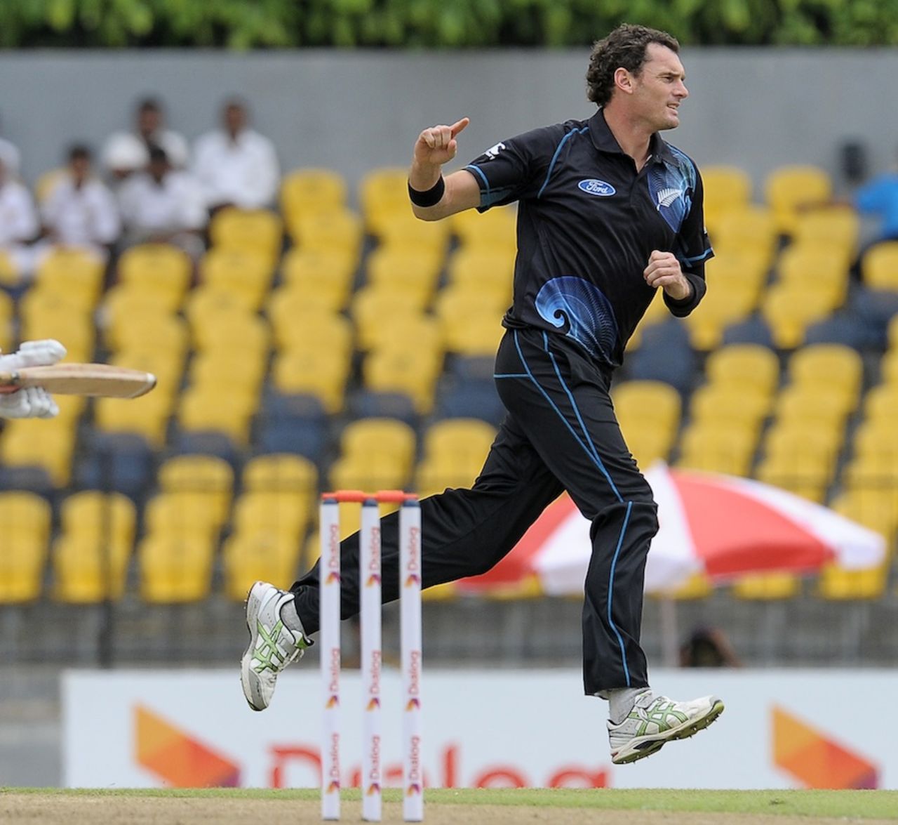 Kyle Mills celebrates Dimuth Karunaratne's wicket, Sri Lanka v New Zealand, 2nd ODI, Hambantota, November 12, 2013