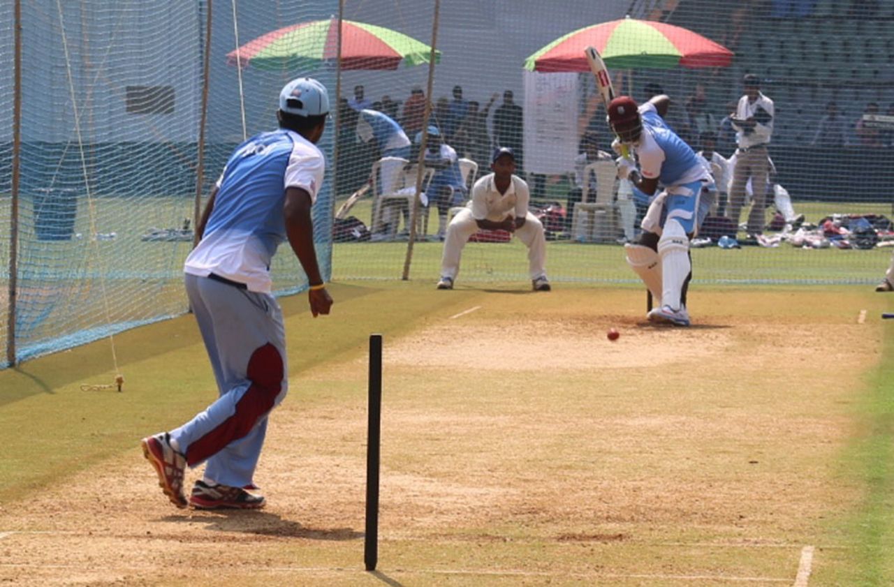 Darren Sammy bats against Veerasammy Permaul, Mumbai, November 12, 2013