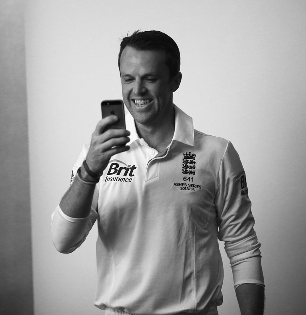 Graeme Swann films England's photo shoot on his phone, Sydney, November 11, 2013