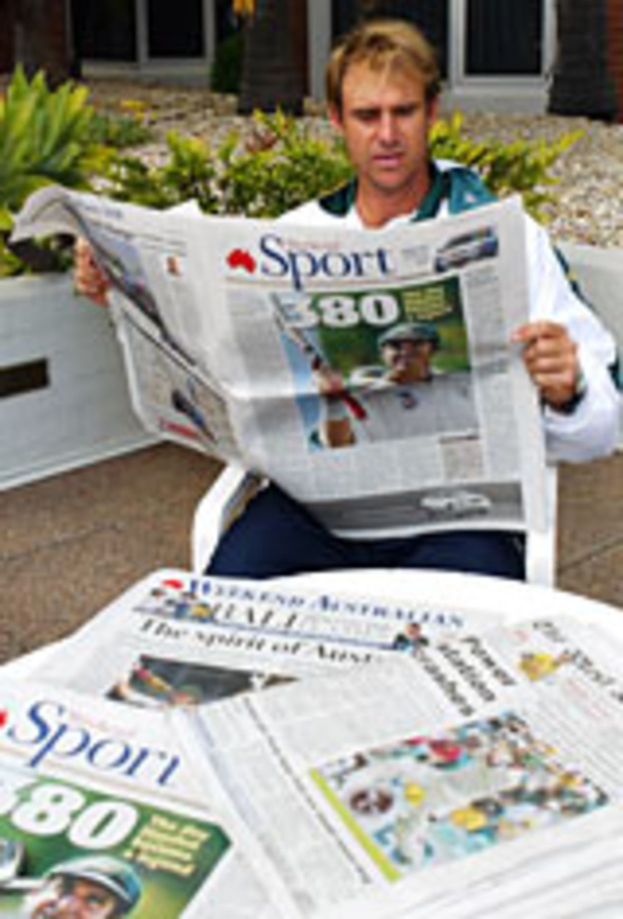 Matthew Hayden reads the papers the day after his 380