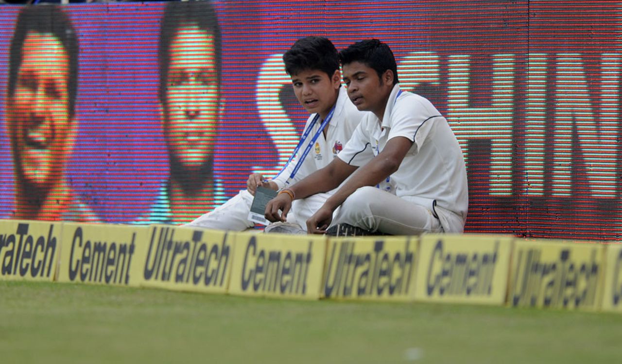 Sachin Tendulkar's son, Arjun, stood as a ball boy during the second day, India v West Indies, 2nd Test, Mumbai, 2nd day, November 15, 2013