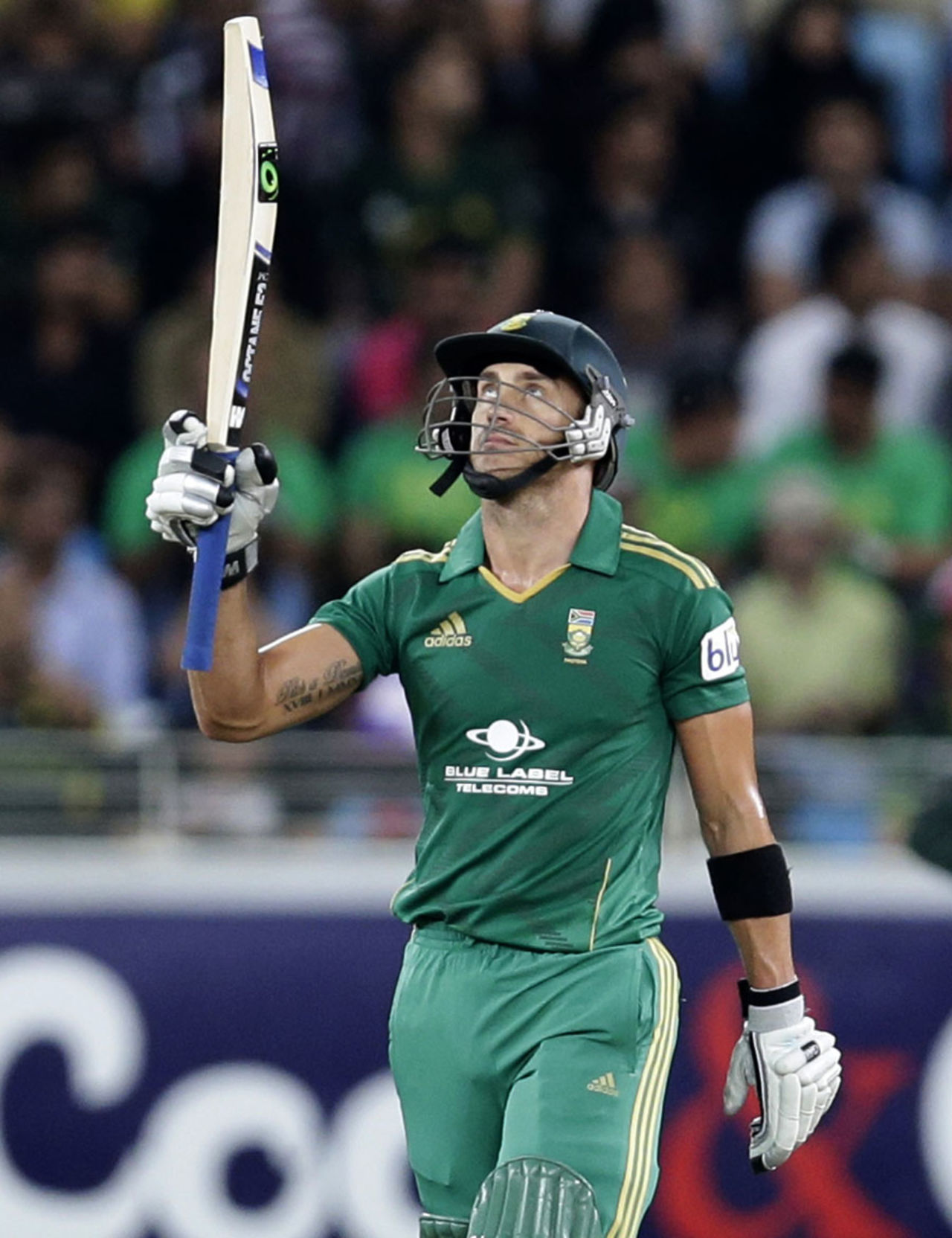 Faf du Plessis raises the bat after reaching his half-century, Pakistan v South Africa, 2nd T20I, Dubai, November 15, 2013