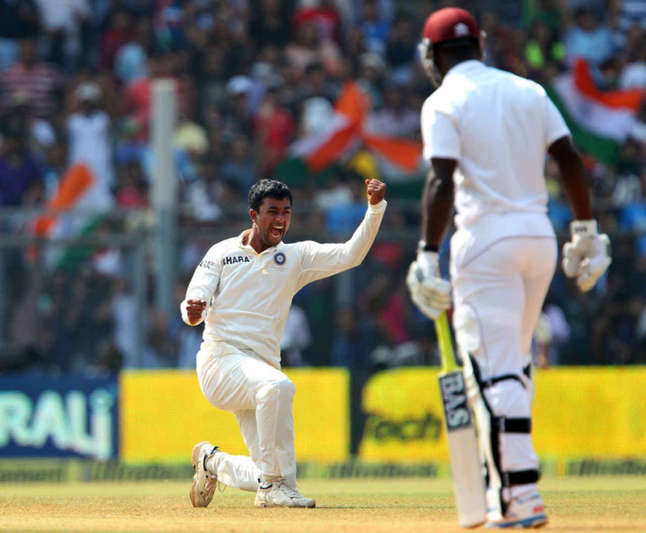 Pragyan Ojha exults after dismissing Darren Sammy, India v West Indies, 2nd Test, Mumbai, 3rd day, November 16, 2013