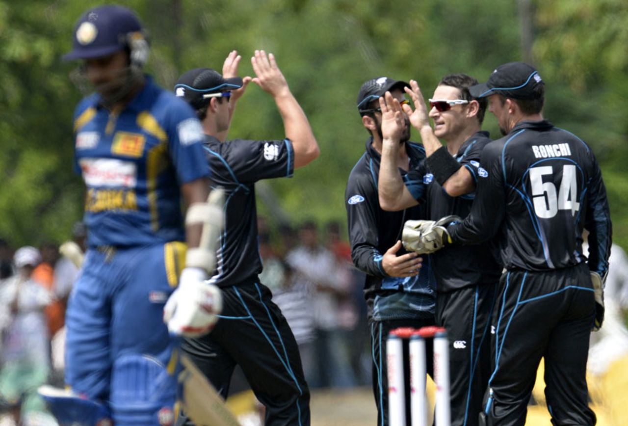 The New Zealand players celebrate the wicket of Mahela Jayawardene, Sri Lanka v New Zealand, 3rd ODI, Dambulla, November 16, 2013