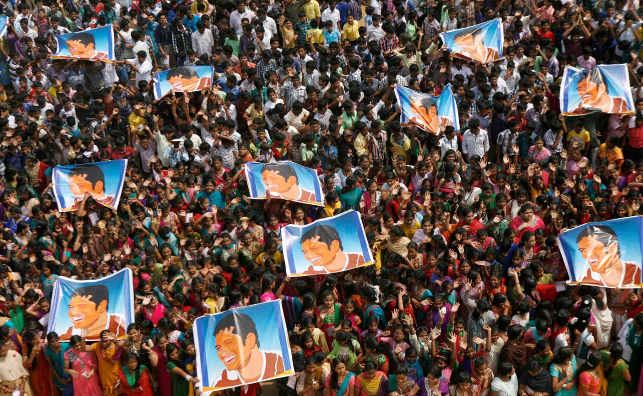 Fans gather with posters of Sachin Tendulkar, Chennai, November 14, 2013
