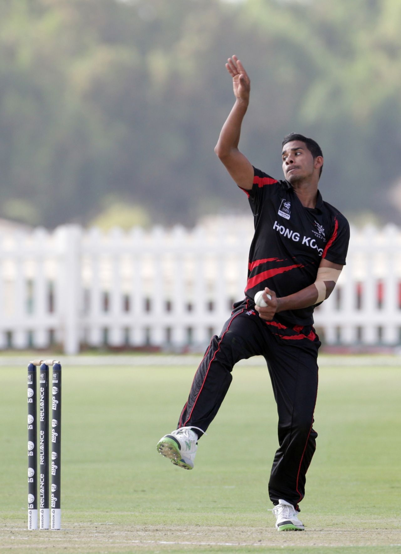 Nadeem Ahmed of Hong Kong bowling in the match between Uganda and Hong Kong at the ICC World Twenty20 Qualifiers at the Zayed Cricket Stadium on November 16, 2013 in Abu Dhabi, United Arab Emirates. (Photo by Graham Crouch-IDI/IDI via Getty Images)