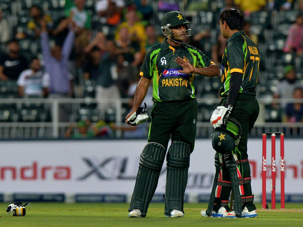 Mohammad Hafeez and Nasir Jamshed have a chat between overs, South Africa v Pakistan, 1st T20I, Johannesburg, November 20, 2013