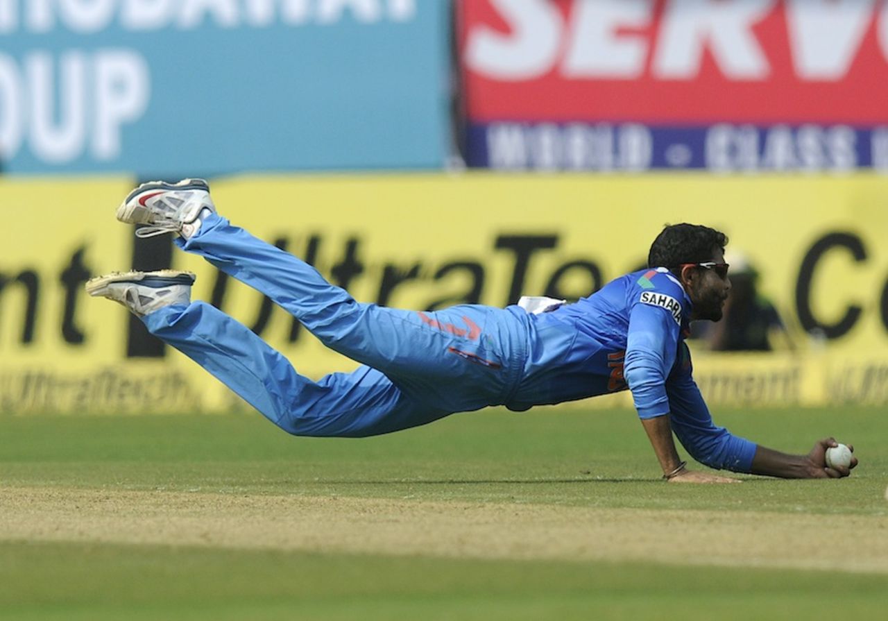 Ravindra Jadeja leaps to take a return catch, India v West Indies, 1st ODI, Kochi, November 21, 2013