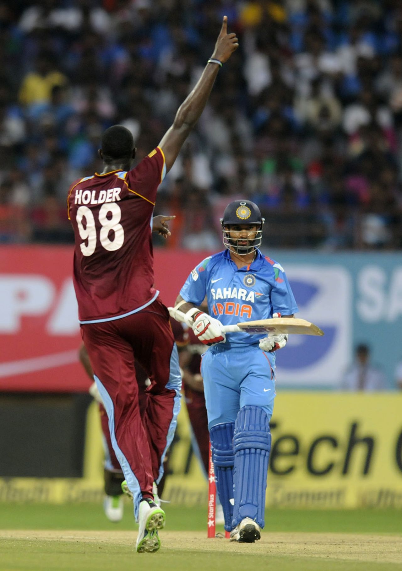 Jason Holder exults after dismissing Shikhar Dhawan, India v West Indies, 1st ODI, Kochi, November 21, 2013