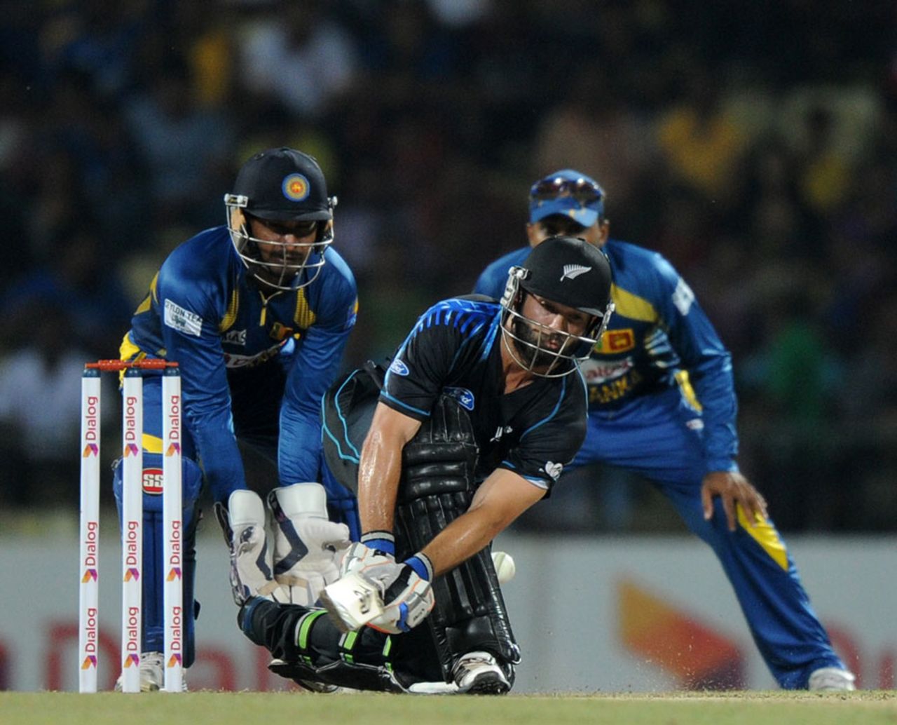 Anton Devcich attempts to sweep the ball, Sri Lanka v New Zealand, 2nd T20I, Pallekele, November 21, 2013