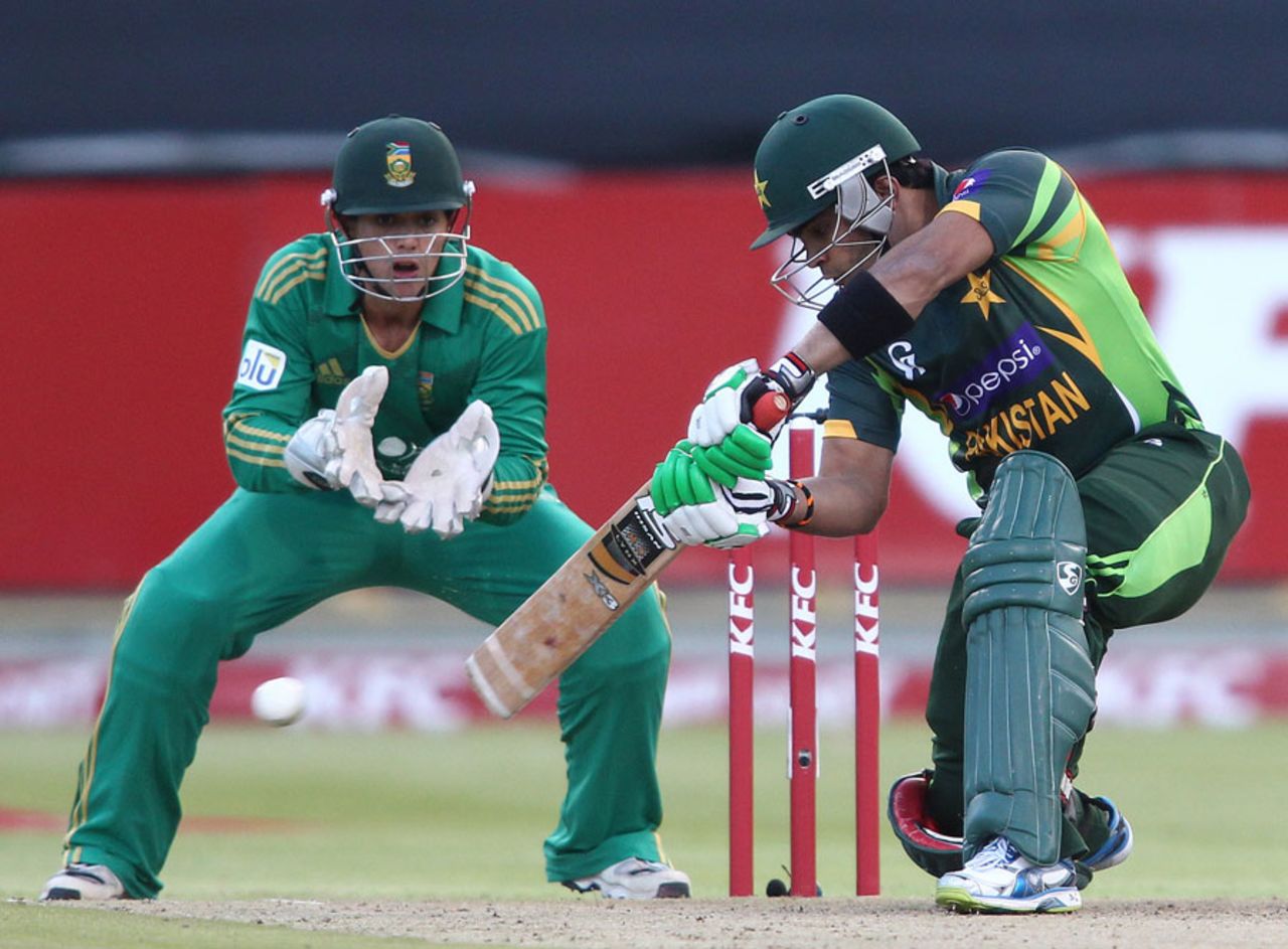 Umar Akmal drives the ball square on the off side, South Africa v Pakistan, 2nd T20I, Cape Town, November 22, 2013 