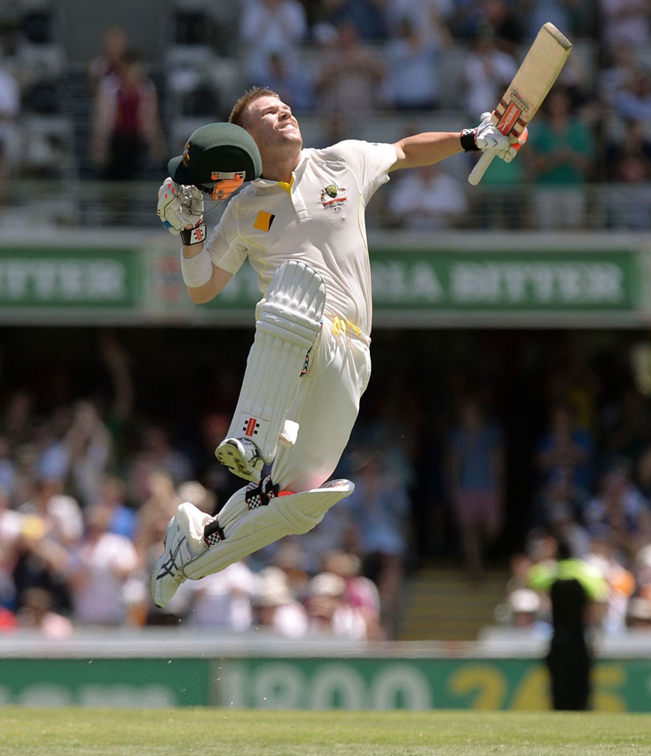 Jumping for joy: David Warner completes his first Ashes hundred, Australia v England, 1st Test, Brisbane, 3rd day, November 23, 2013